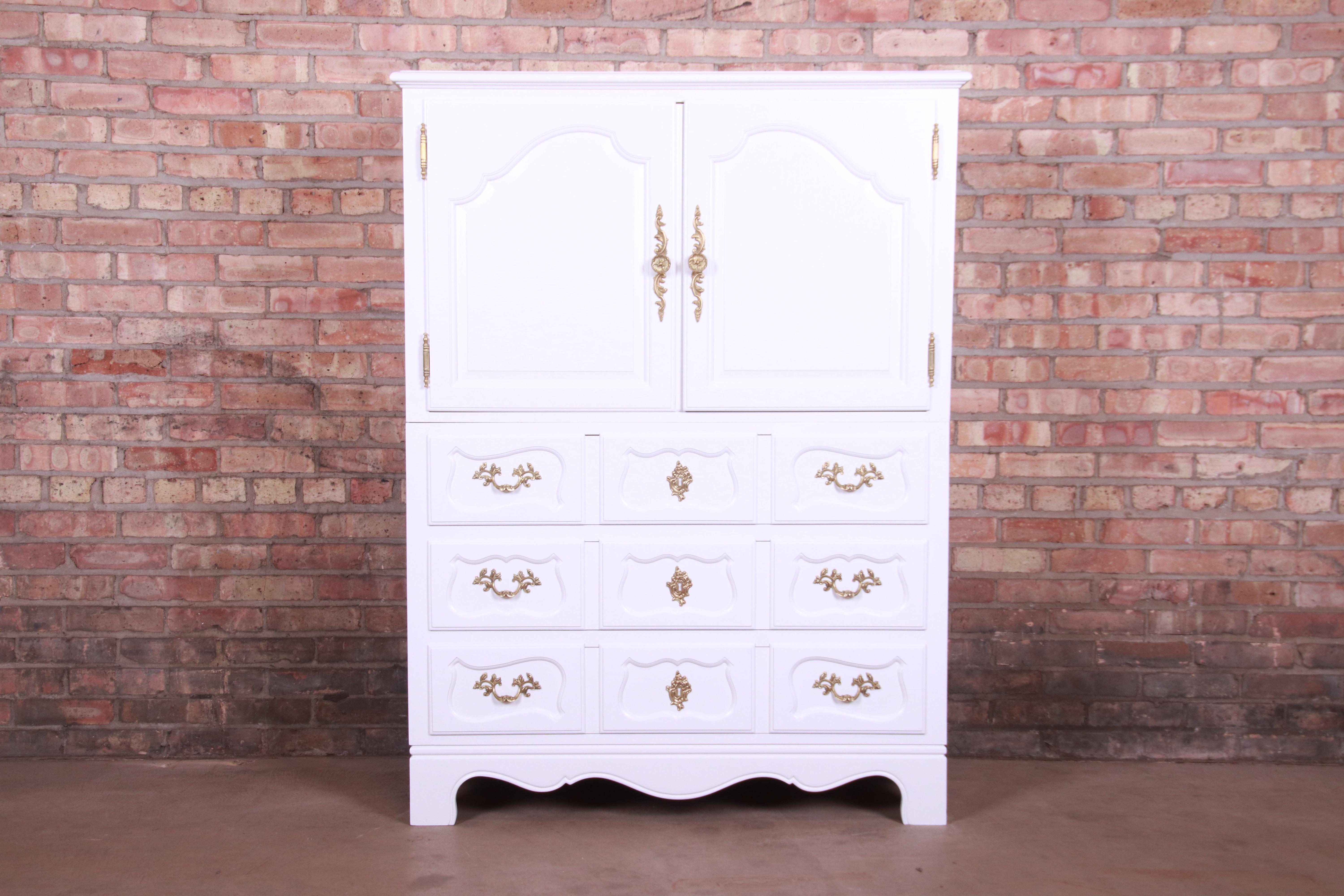 A gorgeous French Provincial Louis XV style highboy dresser or gentleman's chest

By Baker Furniture 