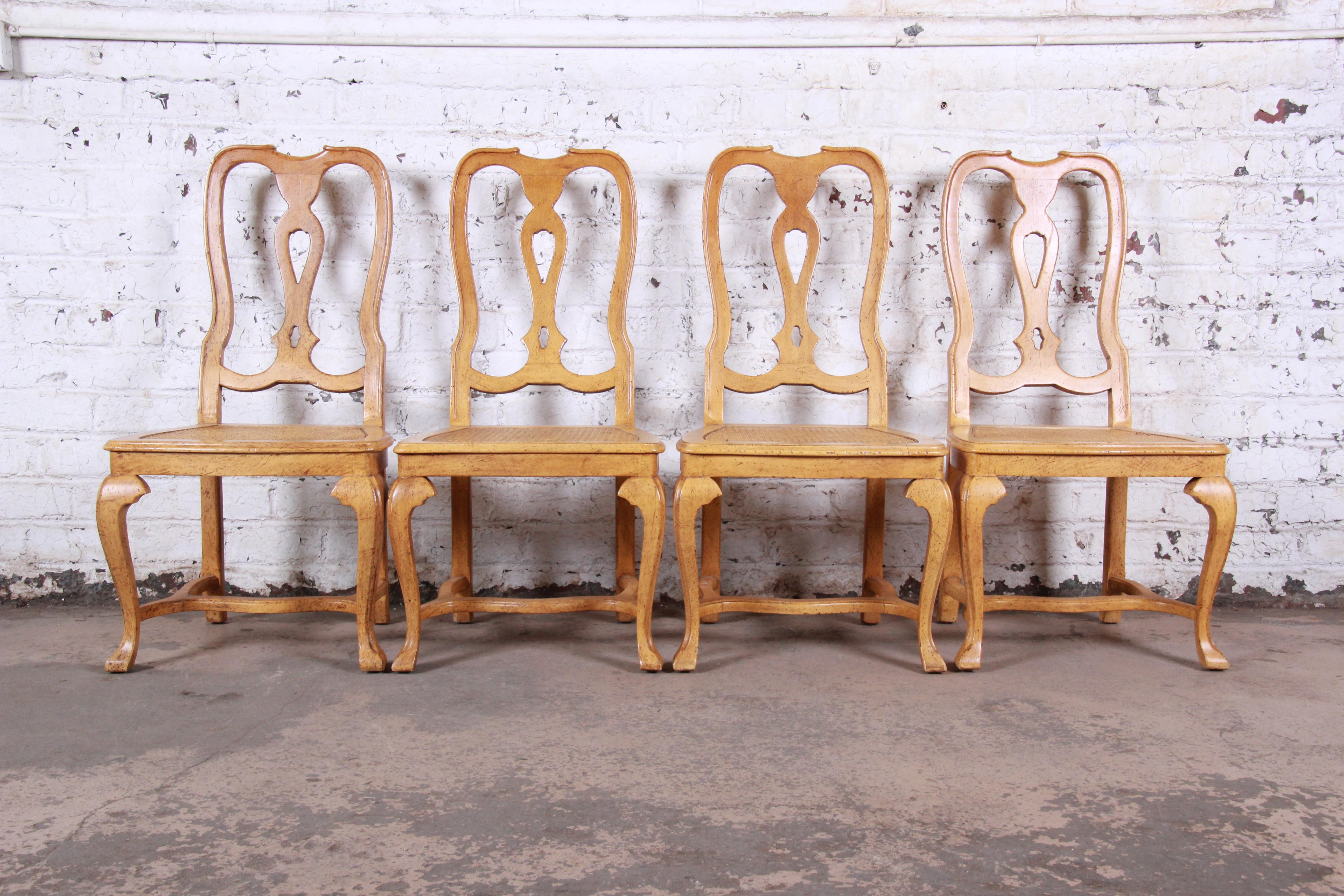A gorgeous set of four French Country Louis XV style white oak and cane dining chairs

By Baker Furniture

USA, circa 1960s

Measures: 21