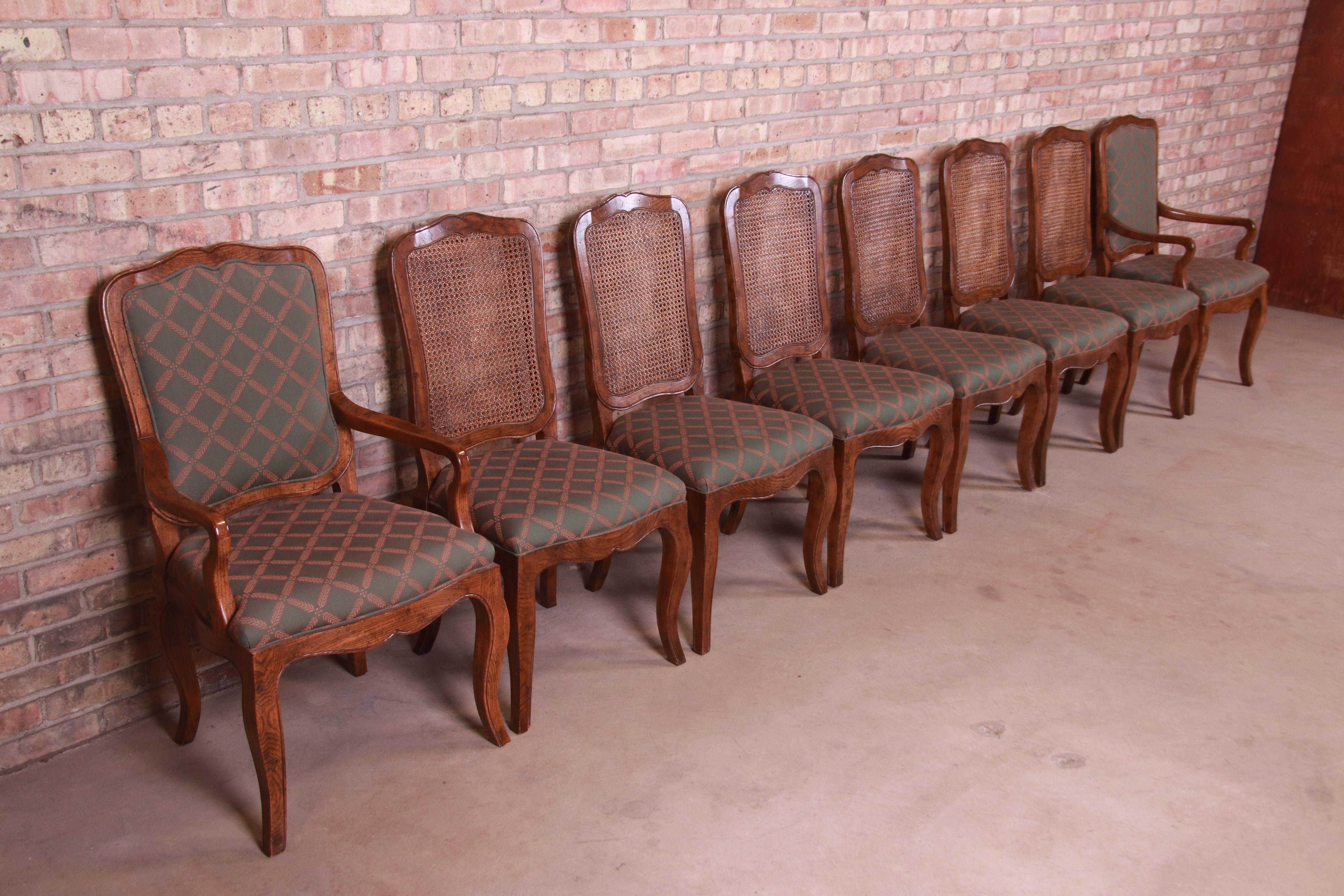 20th Century Baker Furniture French Provincial Louis XV Oak and Cane Dining Chairs, Set of 8