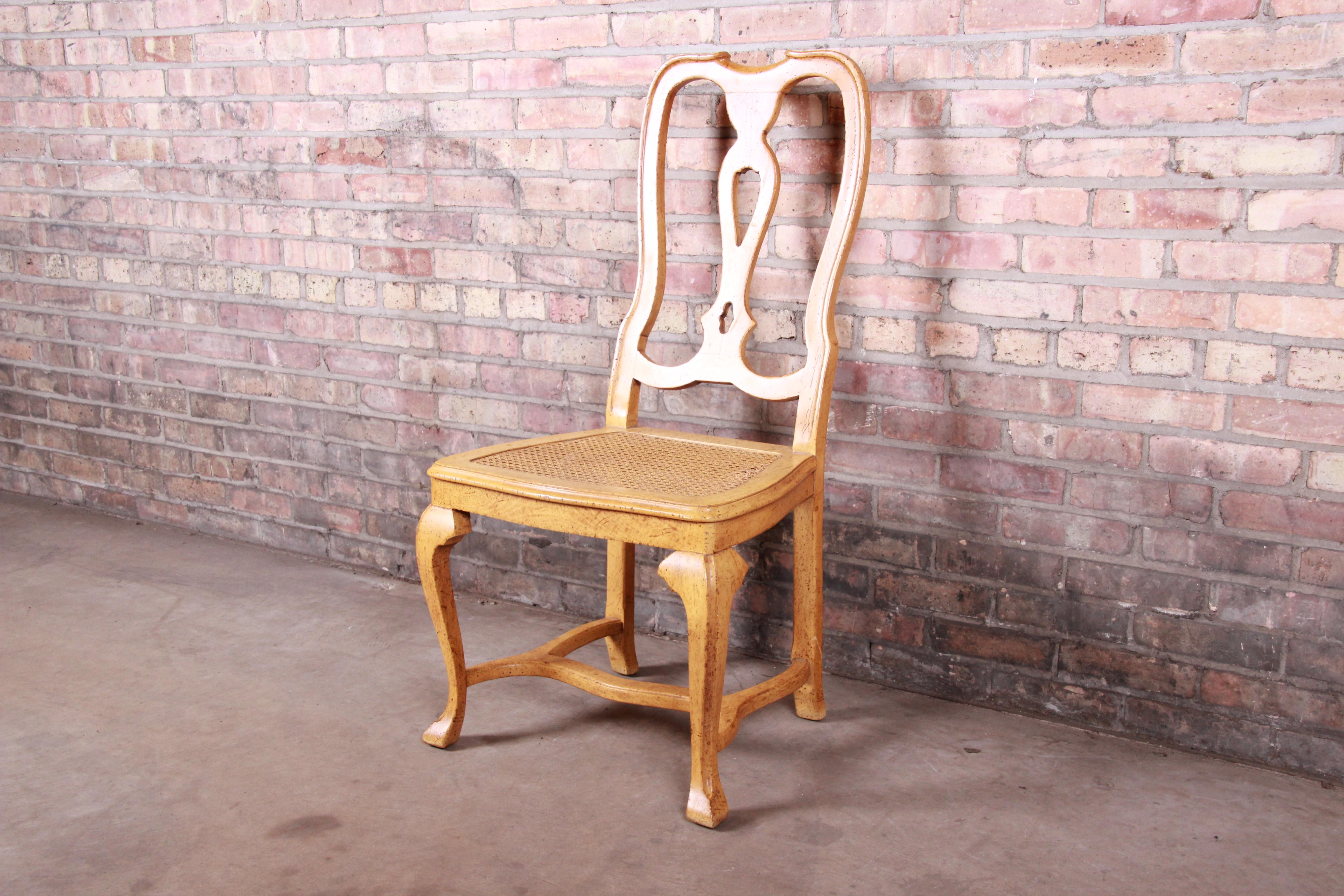 A gorgeous French Country Louis XV style white oak and cane dining chair / desk chair / side chair

By Baker Furniture

USA, circa 1960s

Measures: 21