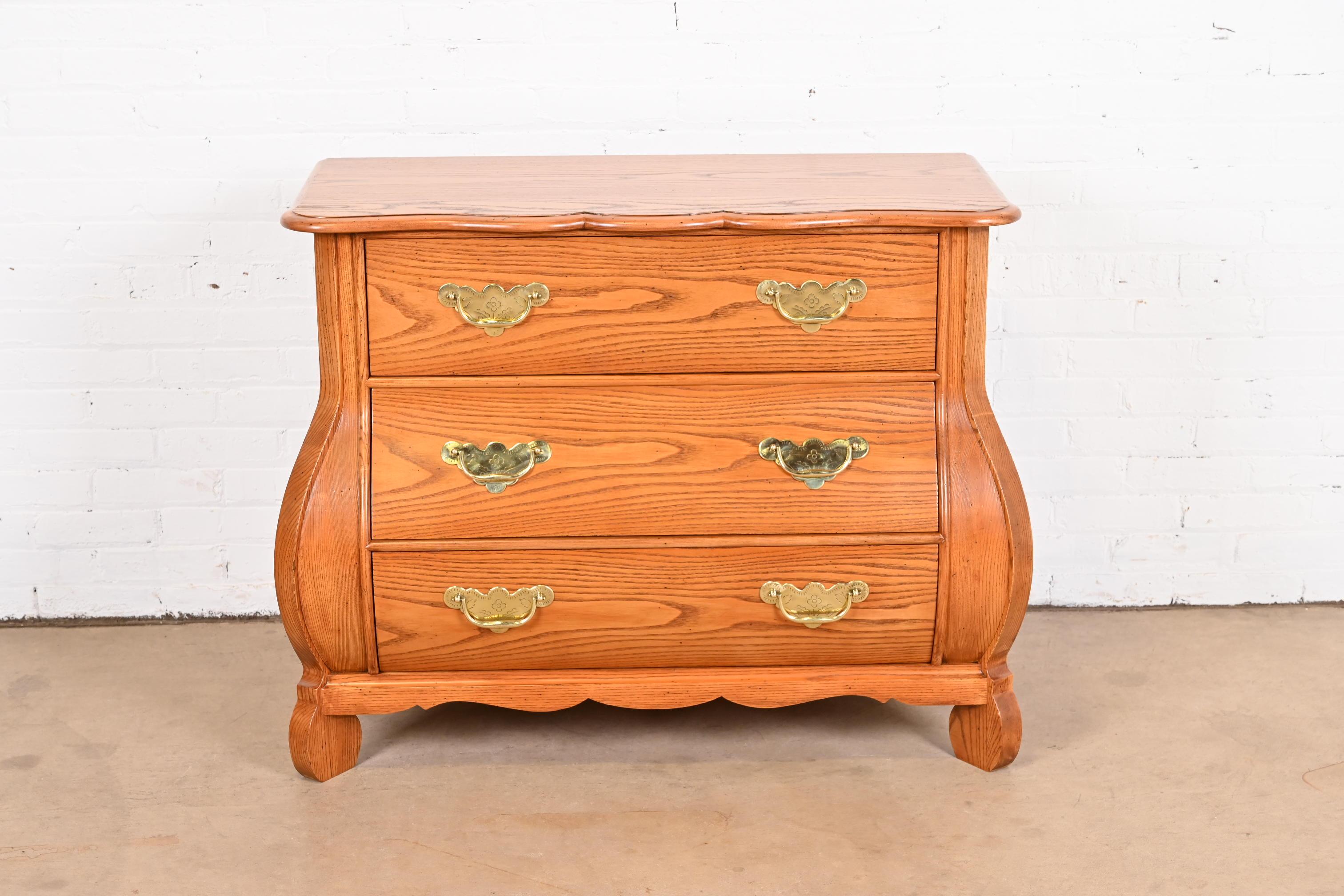 A gorgeous French Provincial Louis XV style bombay chest, commode, or dresser

By Baker Furniture, 