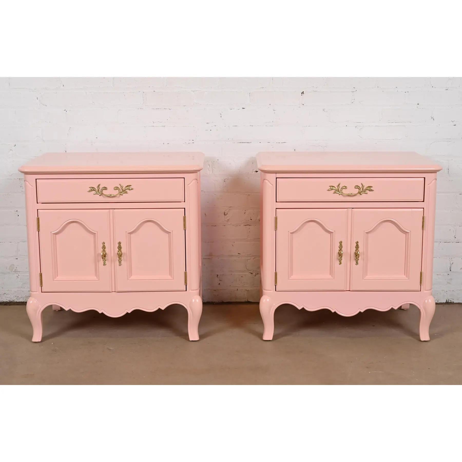 An exceptional pair of French Provincial Louis XV style bedside chests

By Baker Furniture

USA, Late 20th Century

Pink lacquered walnut, with original brass hardware.

Each measures: 25.5