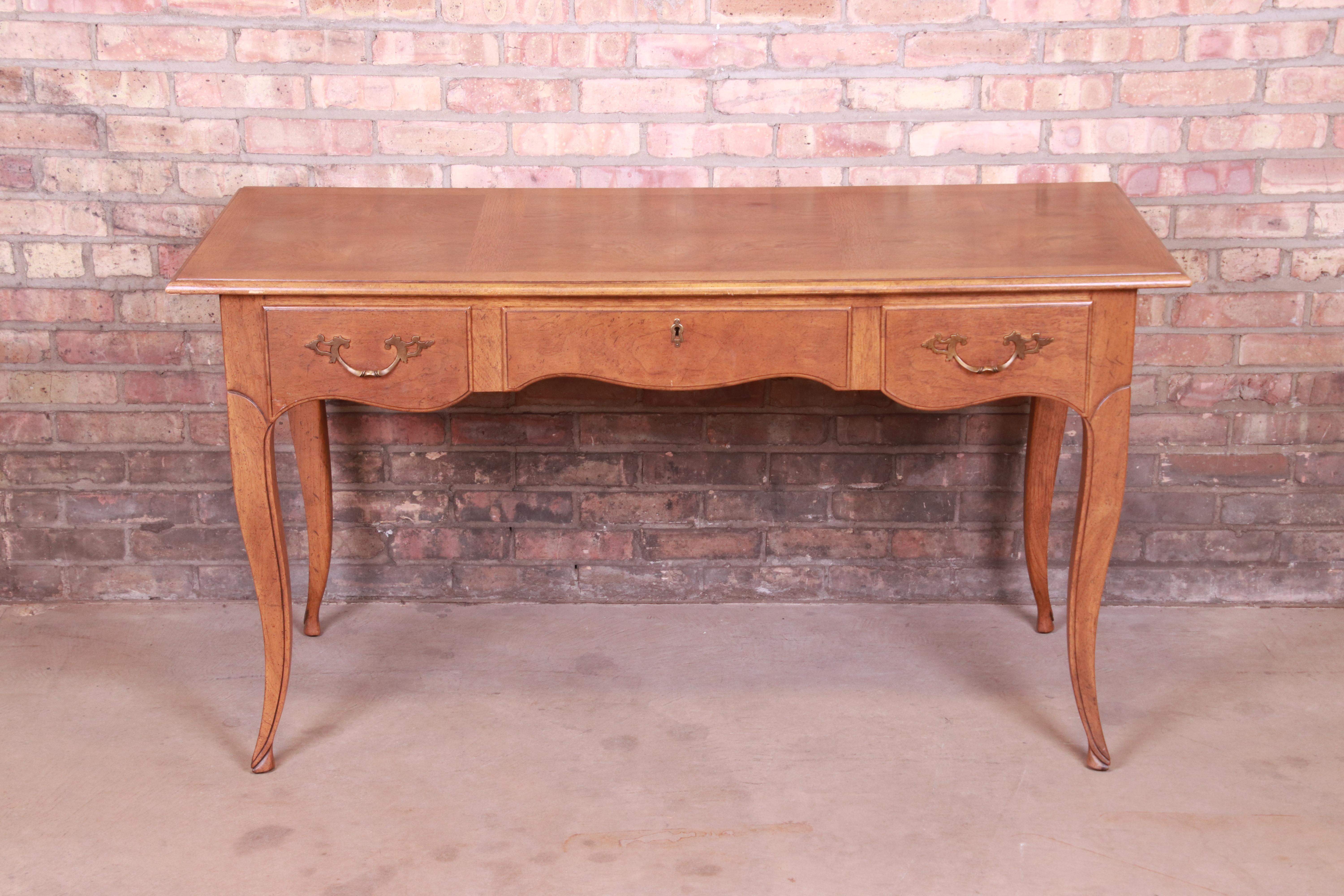 An exceptional French Provincial Louis XV style writing desk

By Baker Furniture 