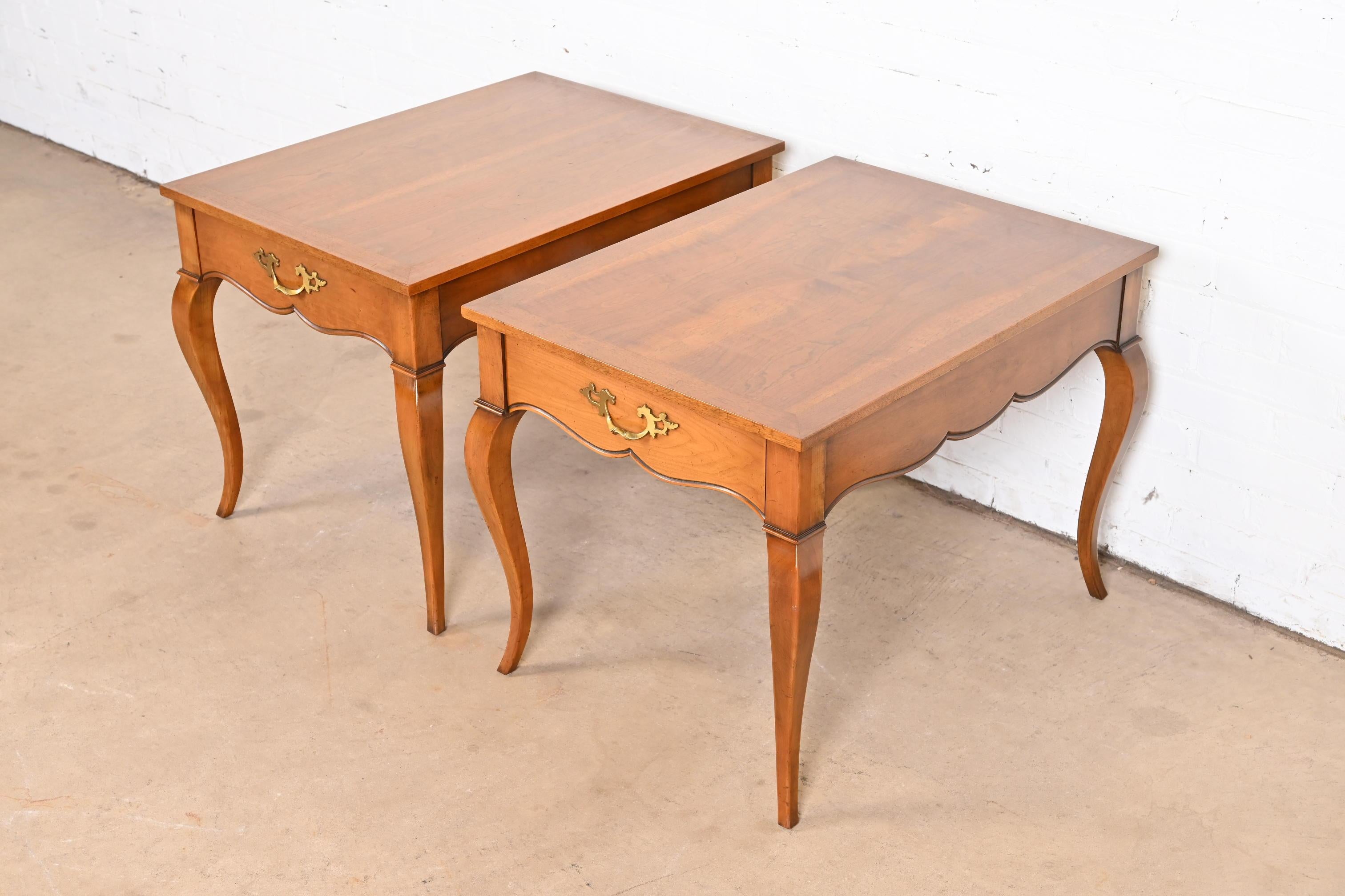 A gorgeous pair of French Provincial Louis XV style nightstands or side tables

By Baker Furniture, 