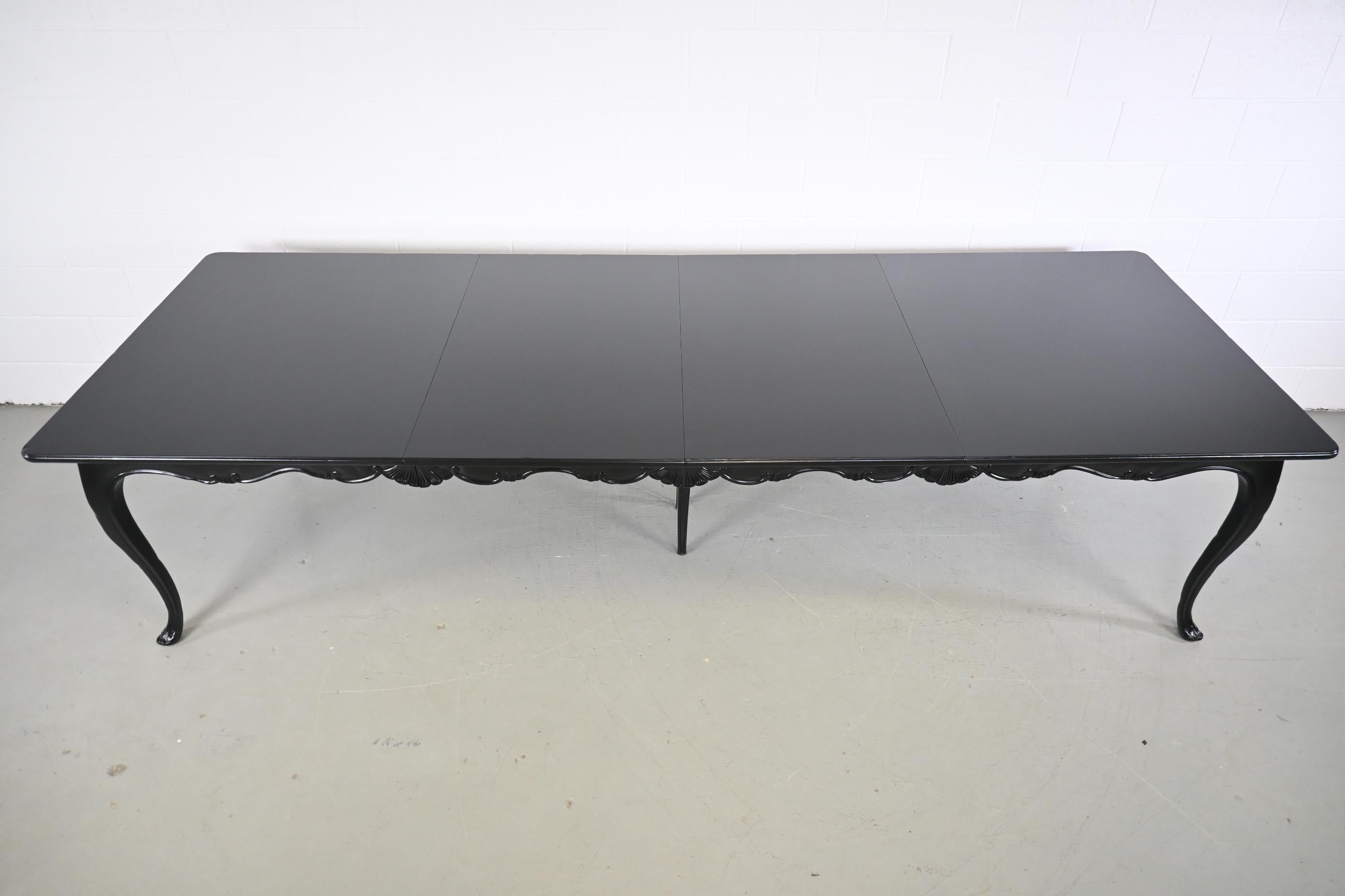 Late 20th Century Baker Furniture French Provincial Style Black Lacquered Extension Dining Table