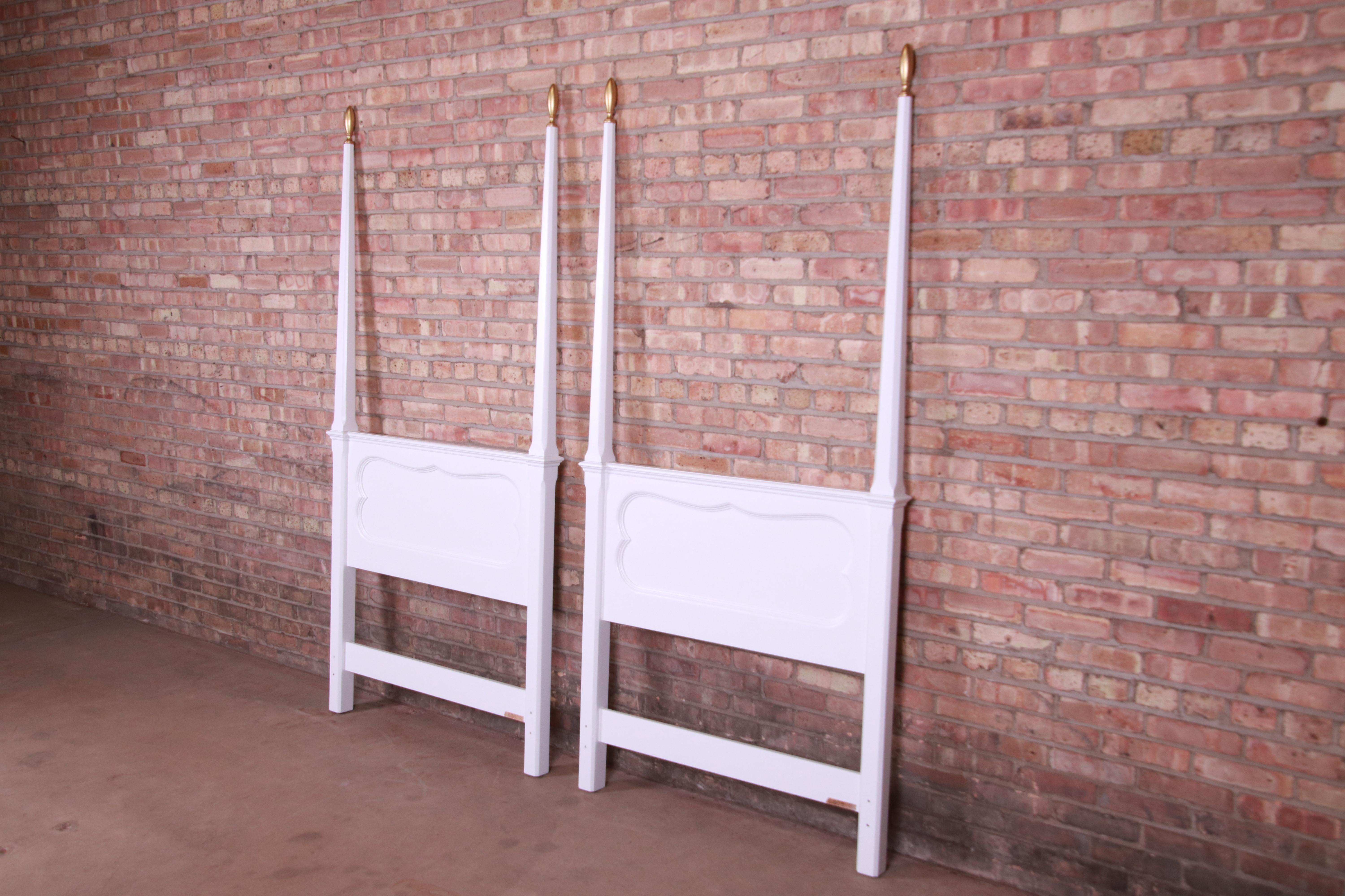 A gorgeous pair of French Provincial Louis XV style twin headboards

By Baker Furniture

USA, circa 1960s

White lacquered walnut, with gold gilt finials.

Measures: 40.5