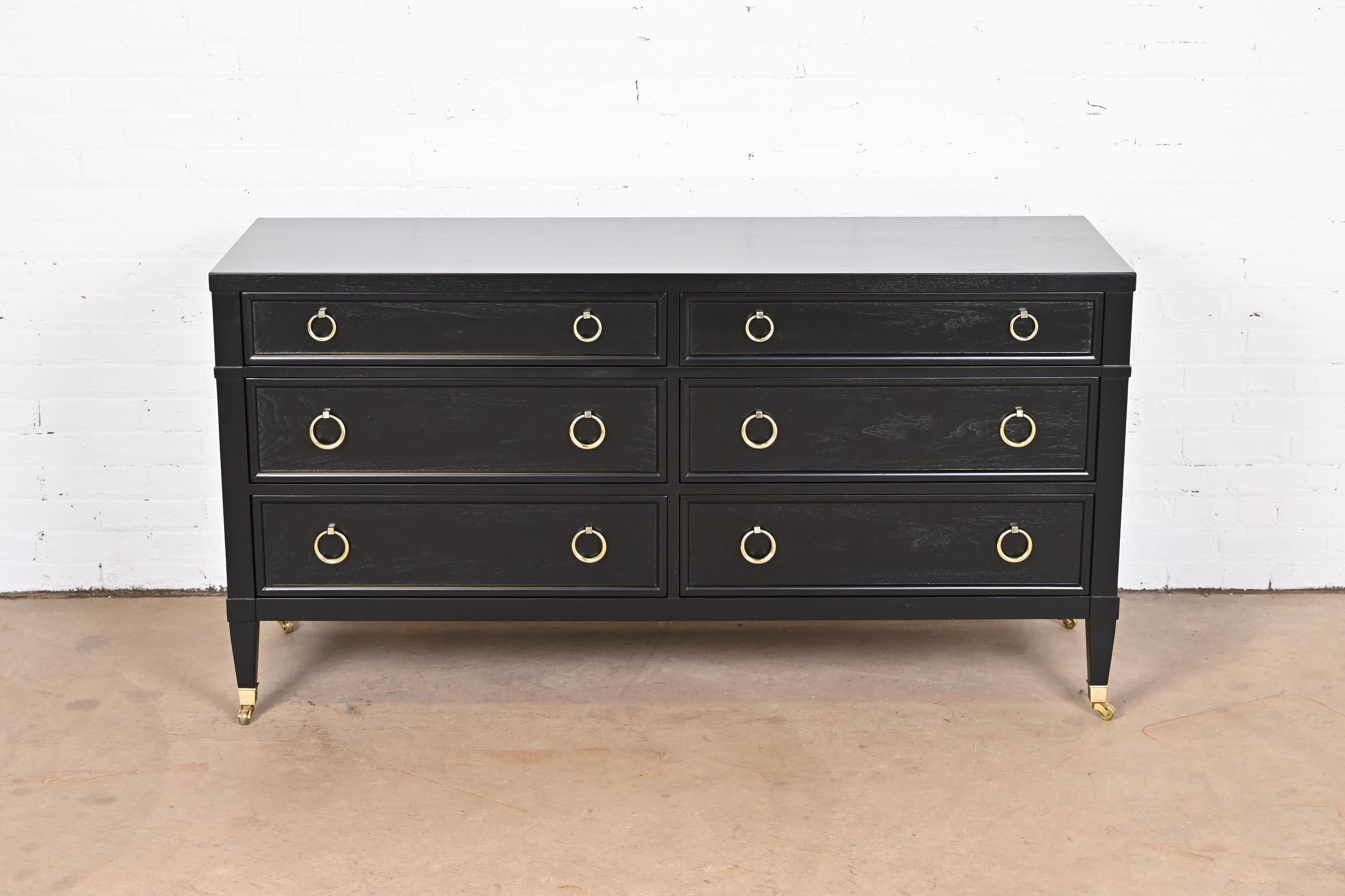 An exceptional Mid-Century French Regency Louis XVI six-drawer dresser or credenza

By Baker Furniture, 