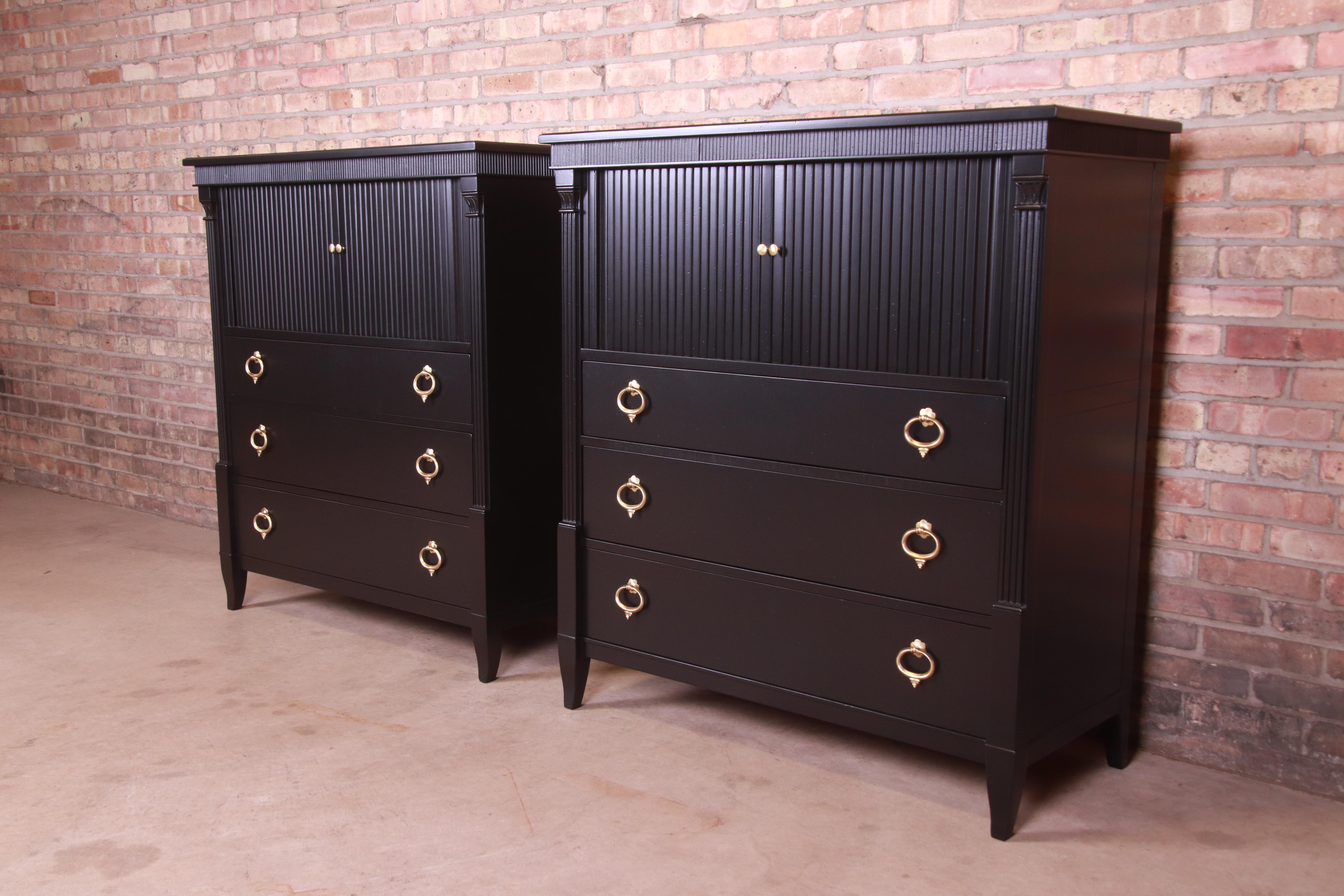 A gorgeous pair of French Regency style tambour door highboy dressers or gentleman's chests

By Baker Furniture

USA, Circa 1960s

Black lacquered walnut, with brass hardware

Measures: 42.25