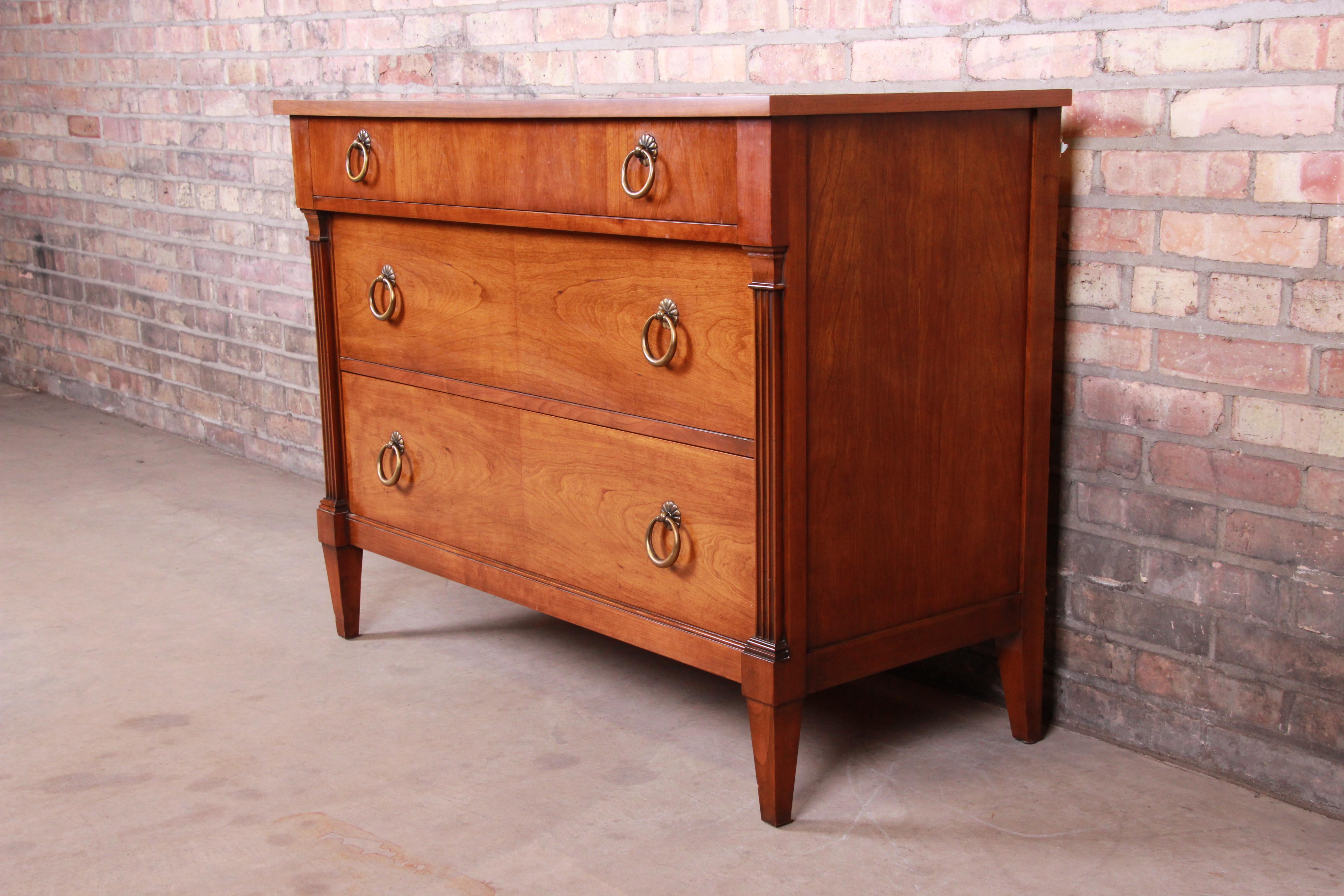 A gorgeous French Regency Louis XVI style three-drawer dresser or bedside chest

By Baker Furniture 