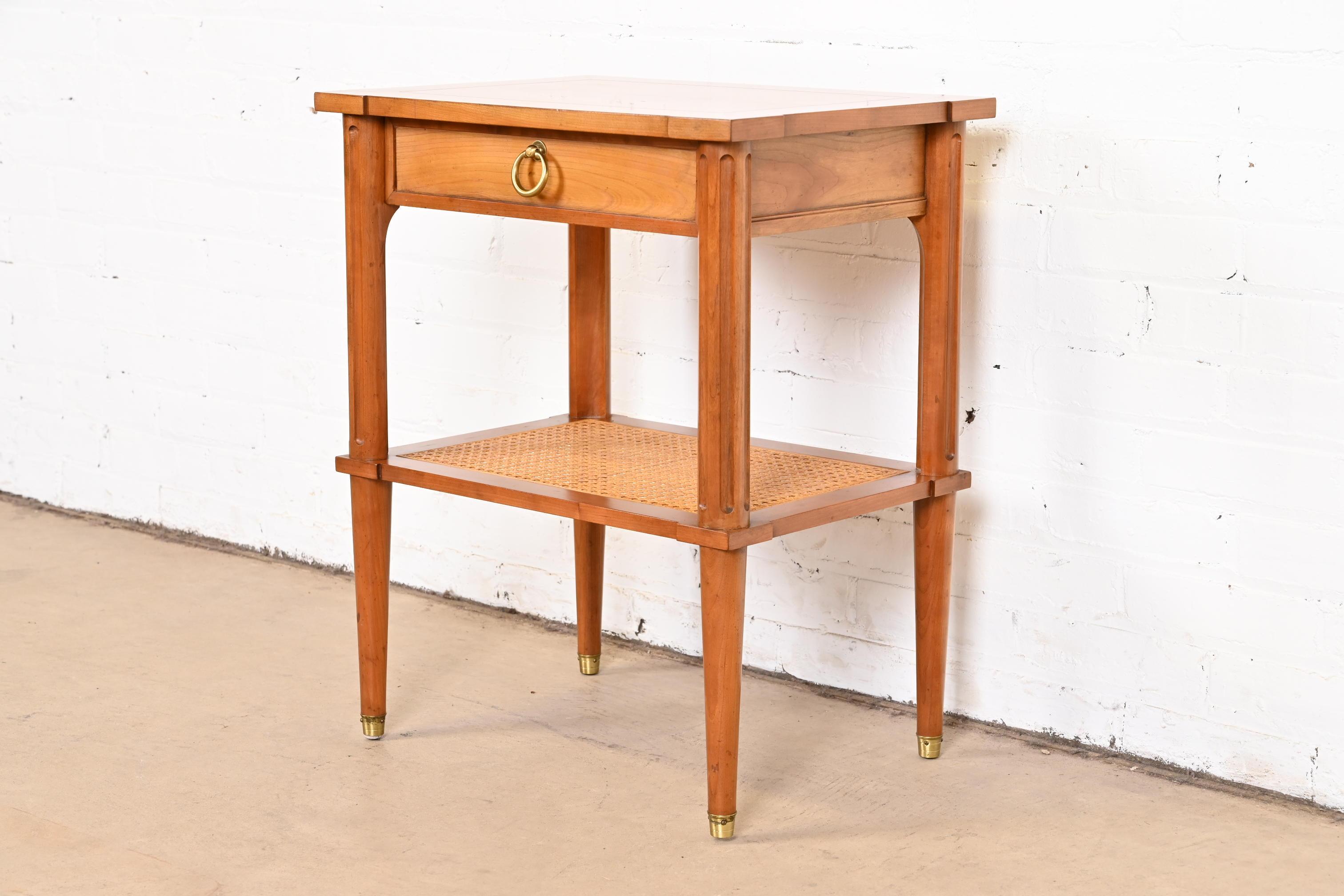 20th Century Baker Furniture French Regency Louis XVI Cherry Wood and Cane Bedside Table