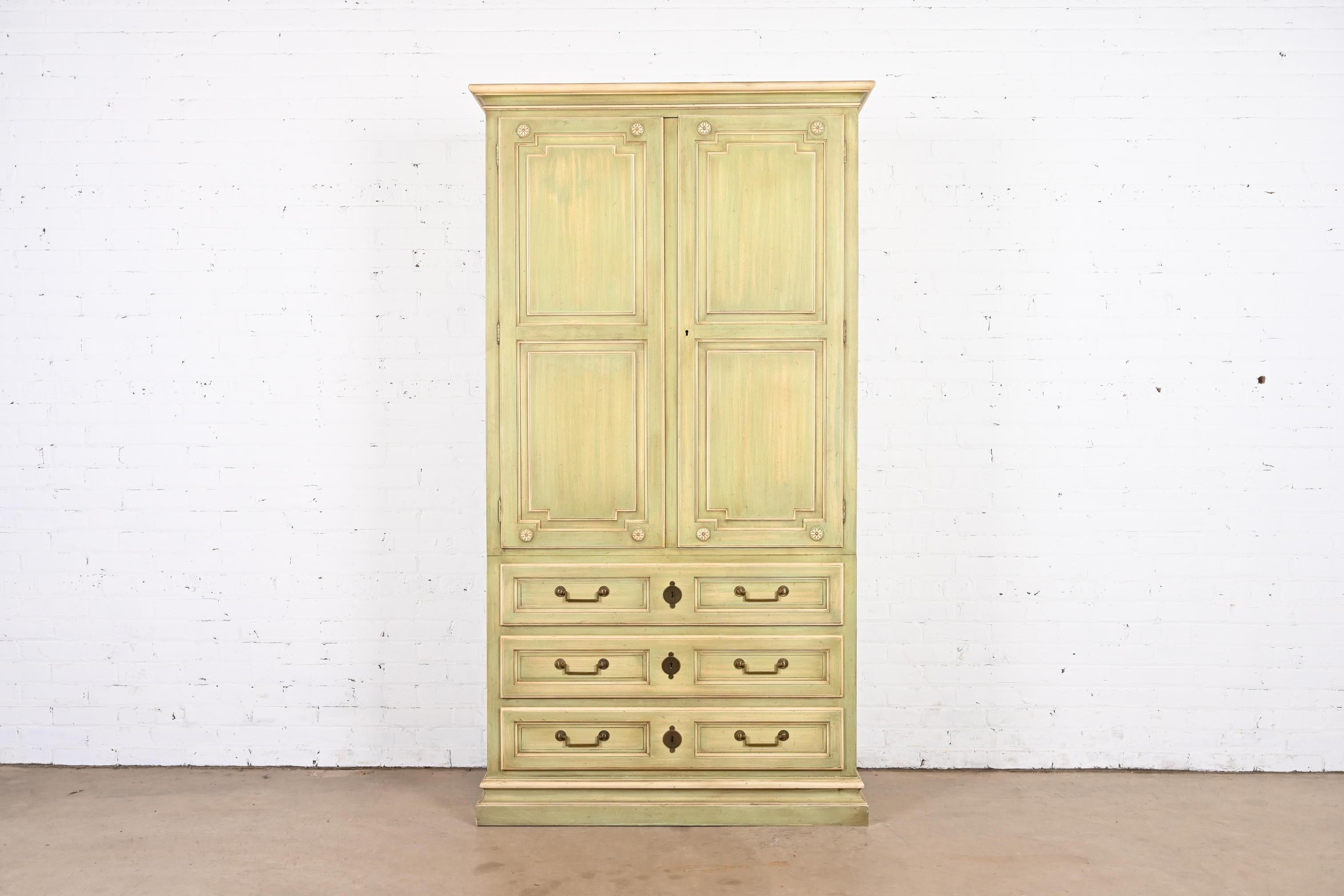 A gorgeous French Regency Louis XVI or Swedish Gustavian style armoire dresser or linen press

By Baker Furniture, 