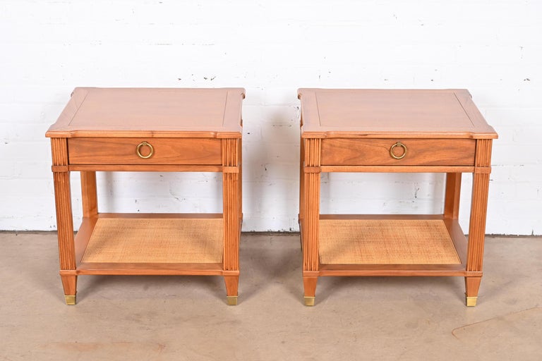 An exceptional pair of French Regency Louis XVI style two-tier nightstands or side tables

By Baker Furniture, 