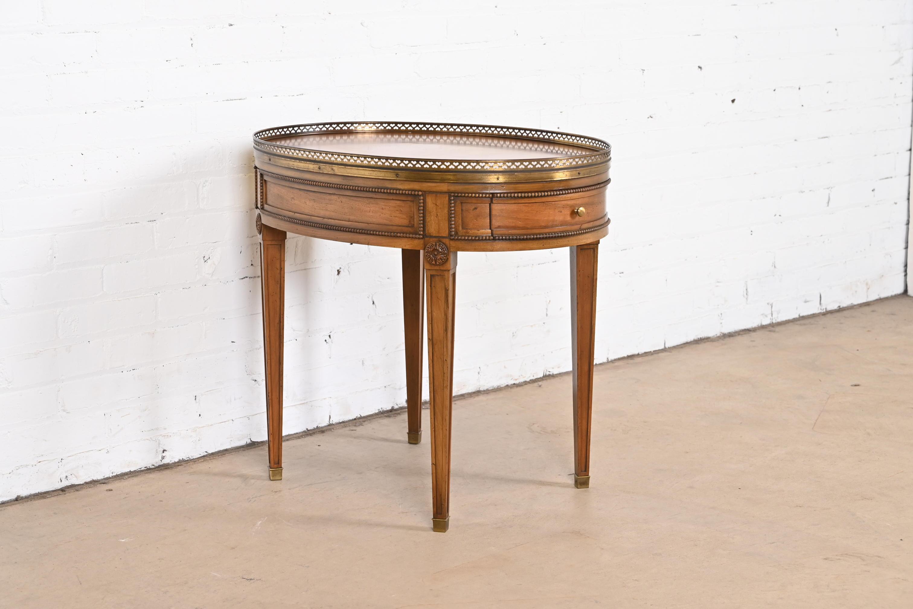 Mid-20th Century Baker Furniture French Regency Louis XVI Walnut, Burl Wood, and Brass Tea Table