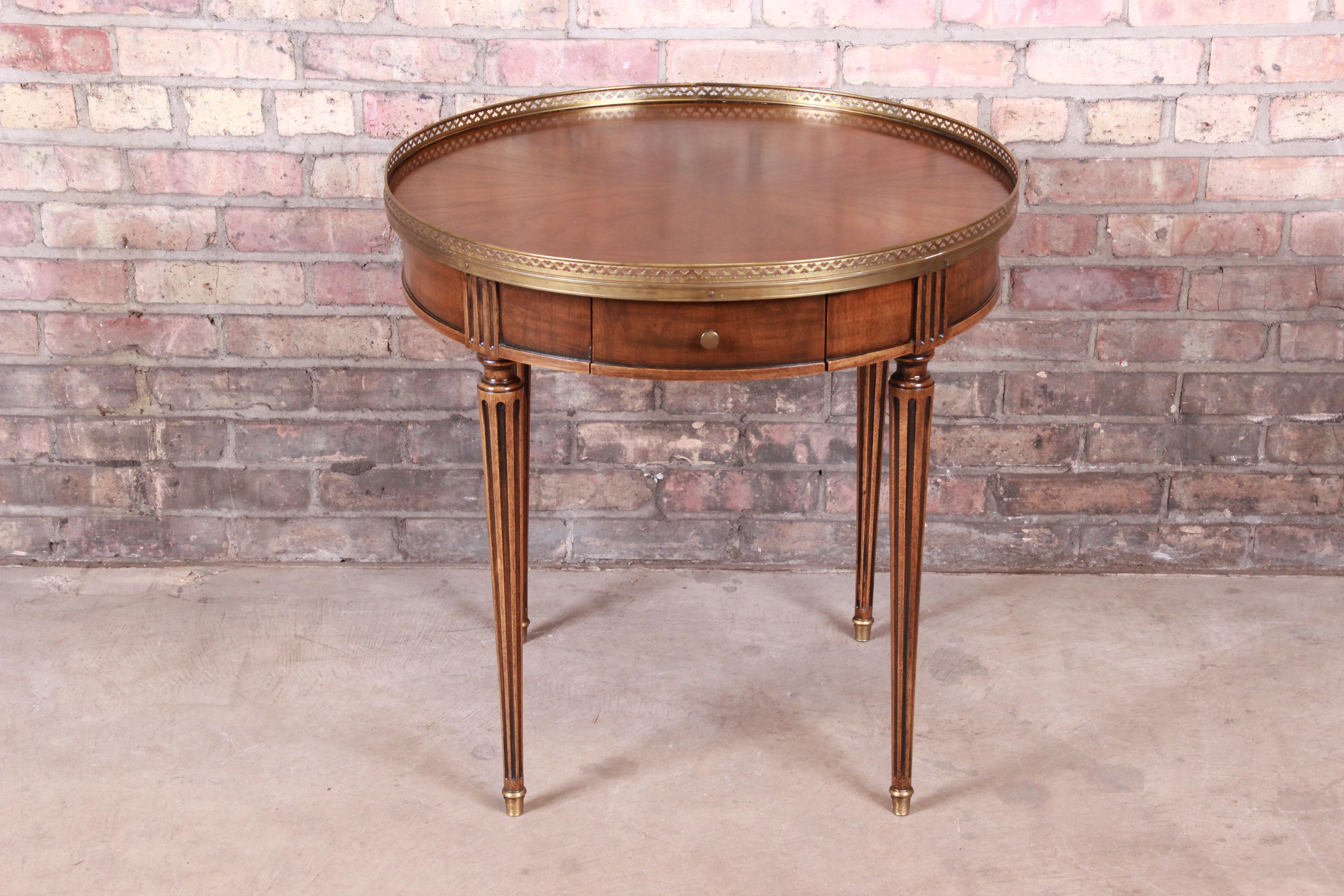 A gorgeous French Regency Louis XVI style tea table

By Baker Furniture 