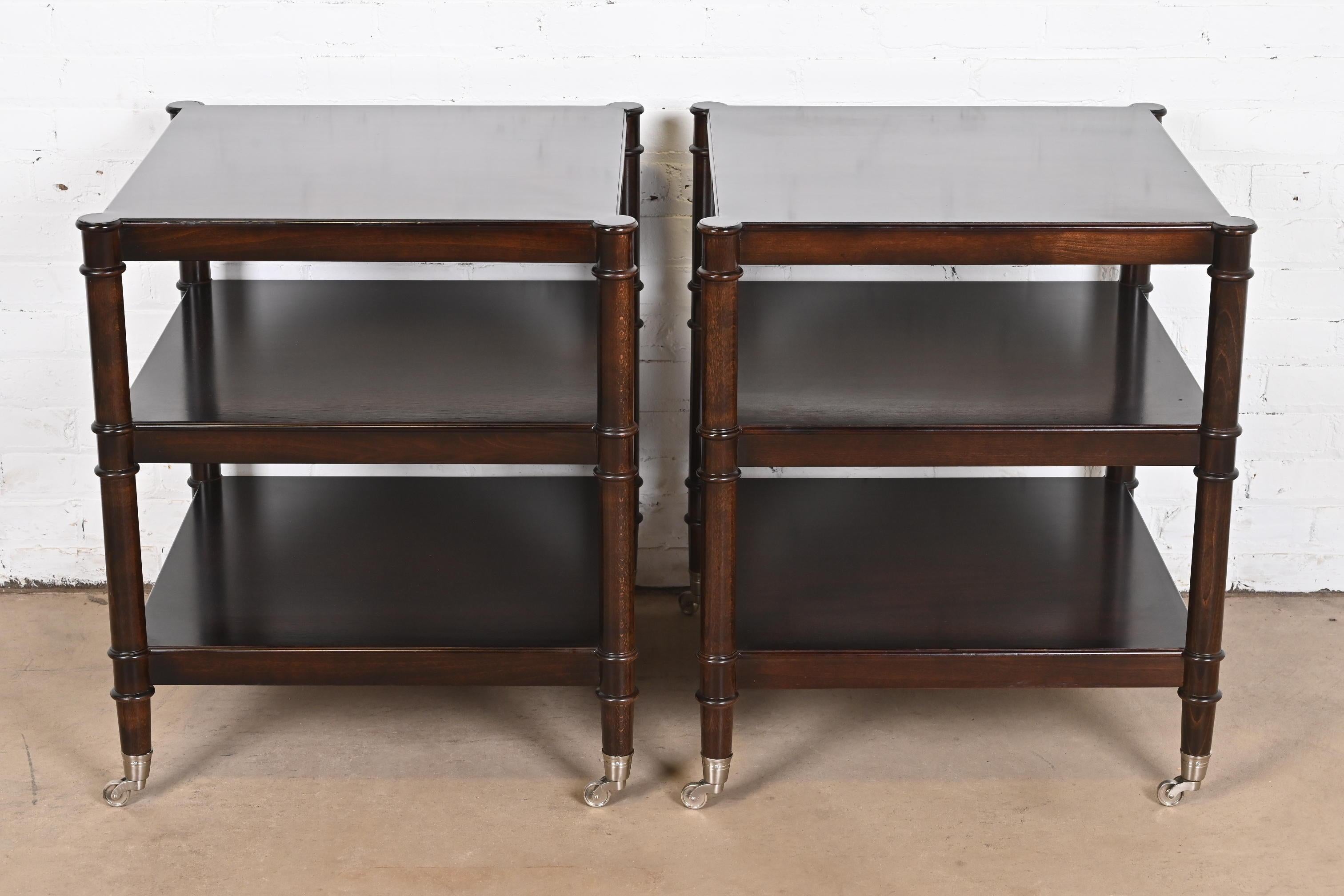 A gorgeous pair of French Regency style nightstands, end tables, or tea tables

By Baker Furniture, 