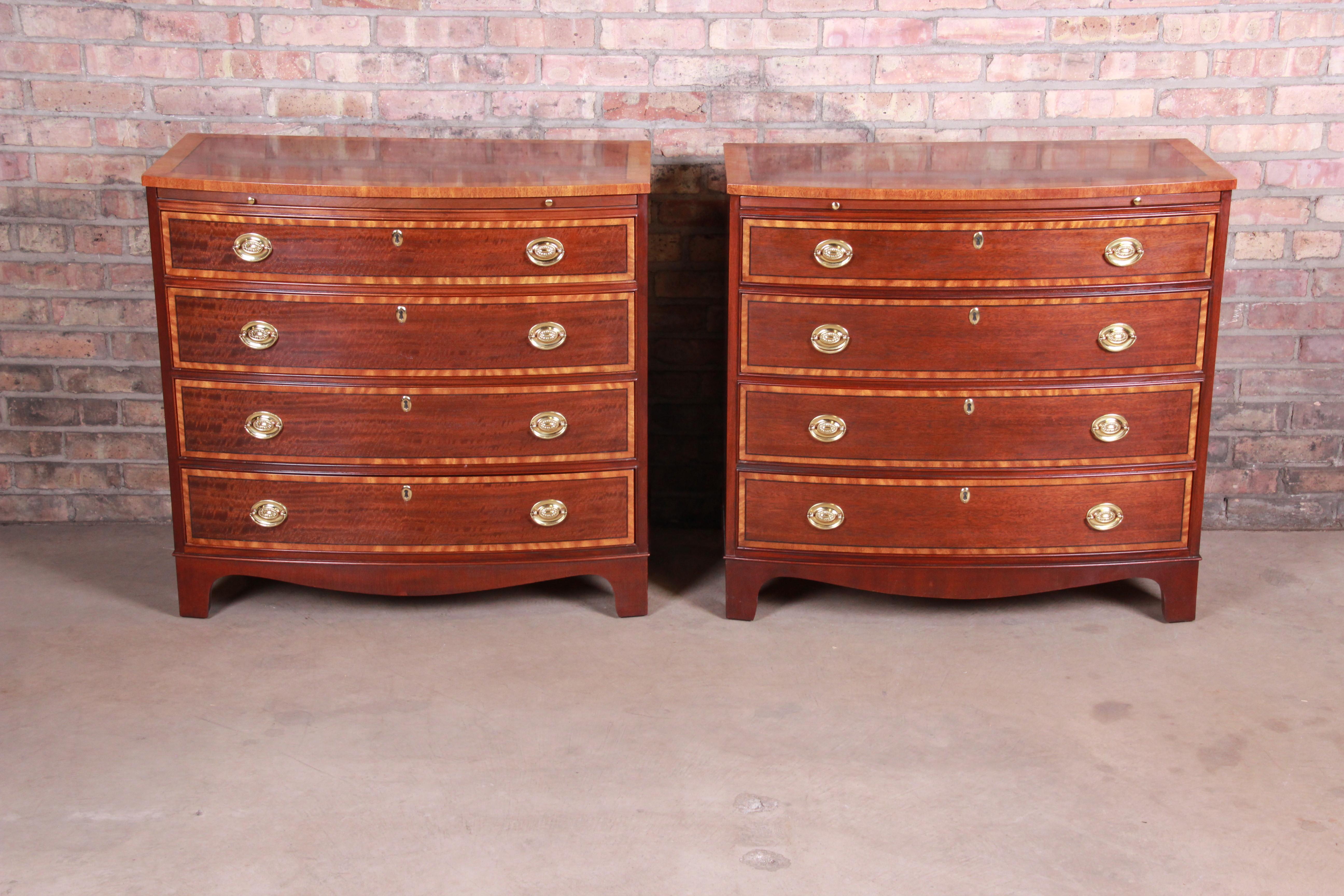 An exceptional pair of Georgian bachelor chests or large bedside chests

By Baker Furniture

USA, circa 1980s

Book-matched mahogany, with satinwood banding and brass hardware.

Measures: 34