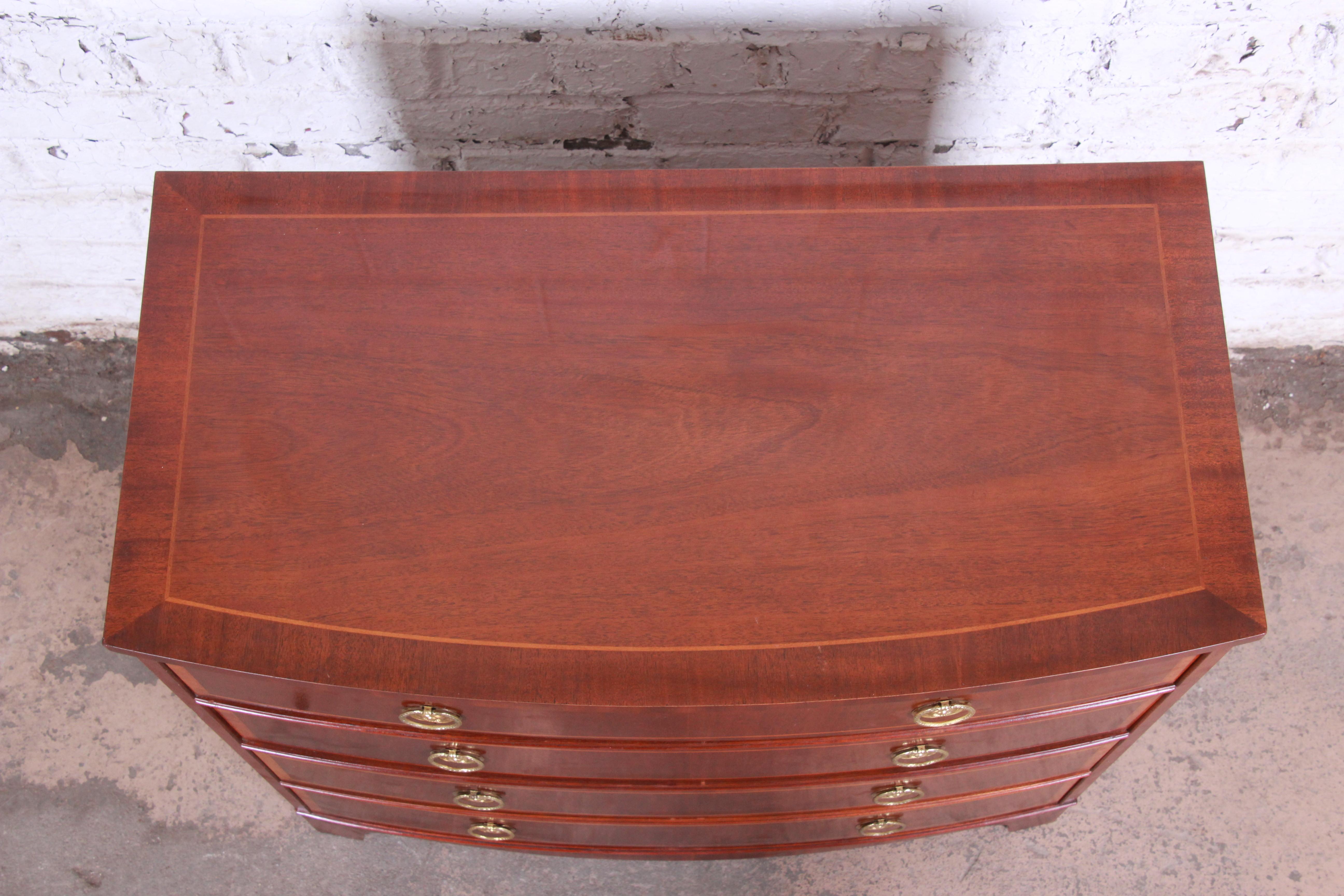 20th Century Baker Furniture Georgian Banded Mahogany Bow Front Chest of Drawers