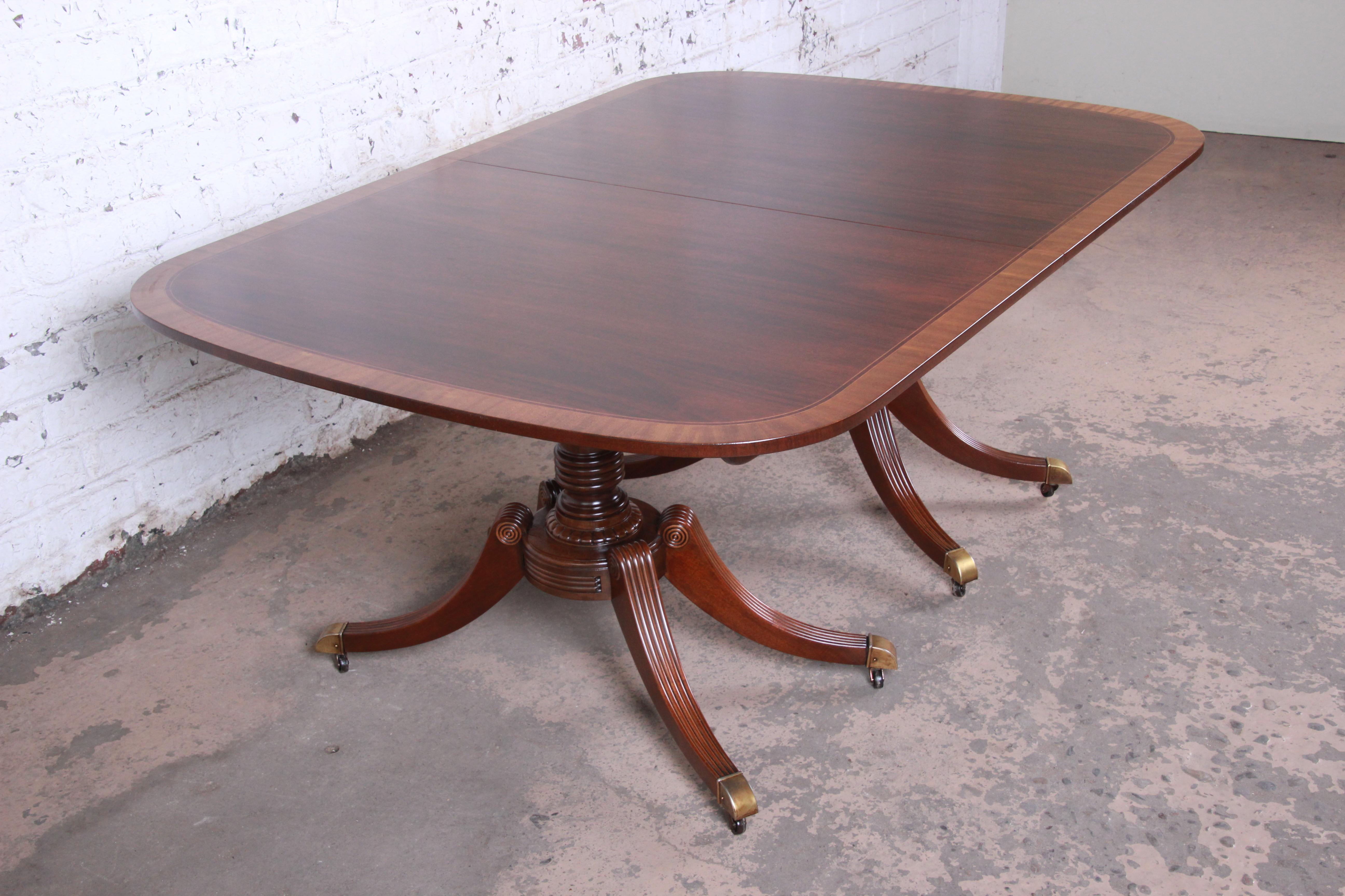 Mid-20th Century Baker Furniture Georgian Banded Mahogany Double Pedestal Dining Table, Restored