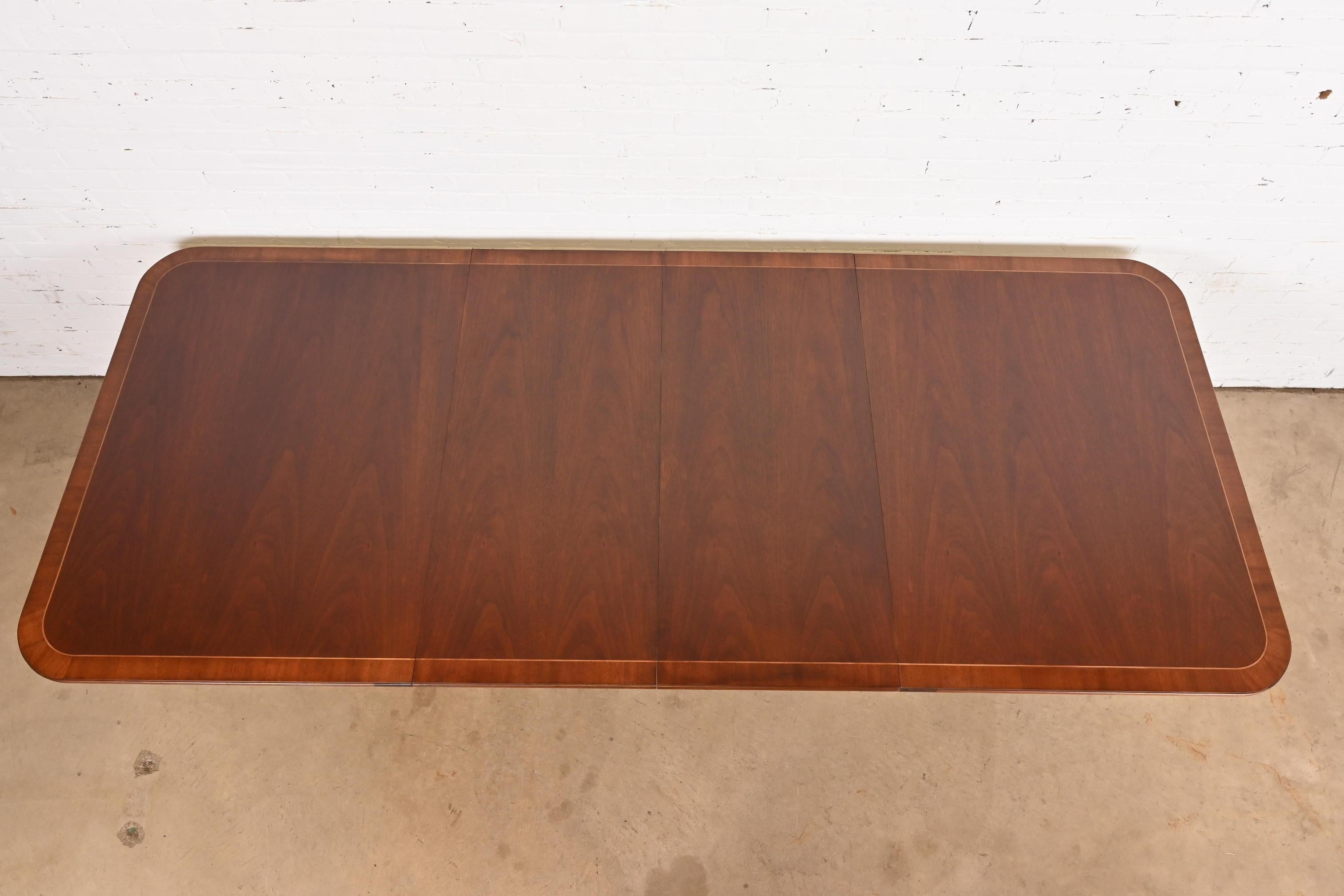 Baker Furniture Georgian Banded Mahogany Double Pedestal Extension Dining Table In Good Condition In South Bend, IN