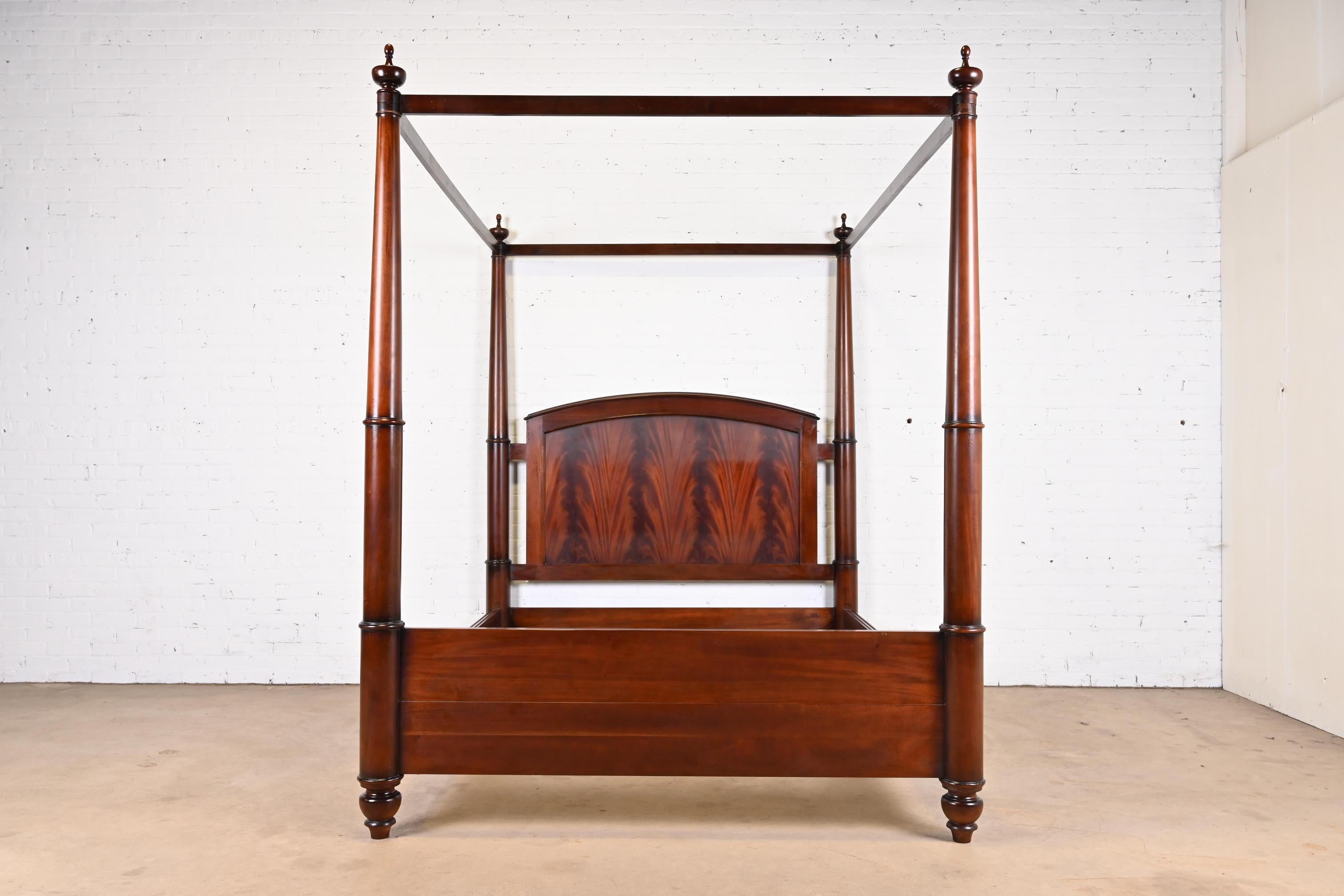 A gorgeous Georgian or Federal style flame mahogany four poster queen size tester bed

By Baker Furniture, 