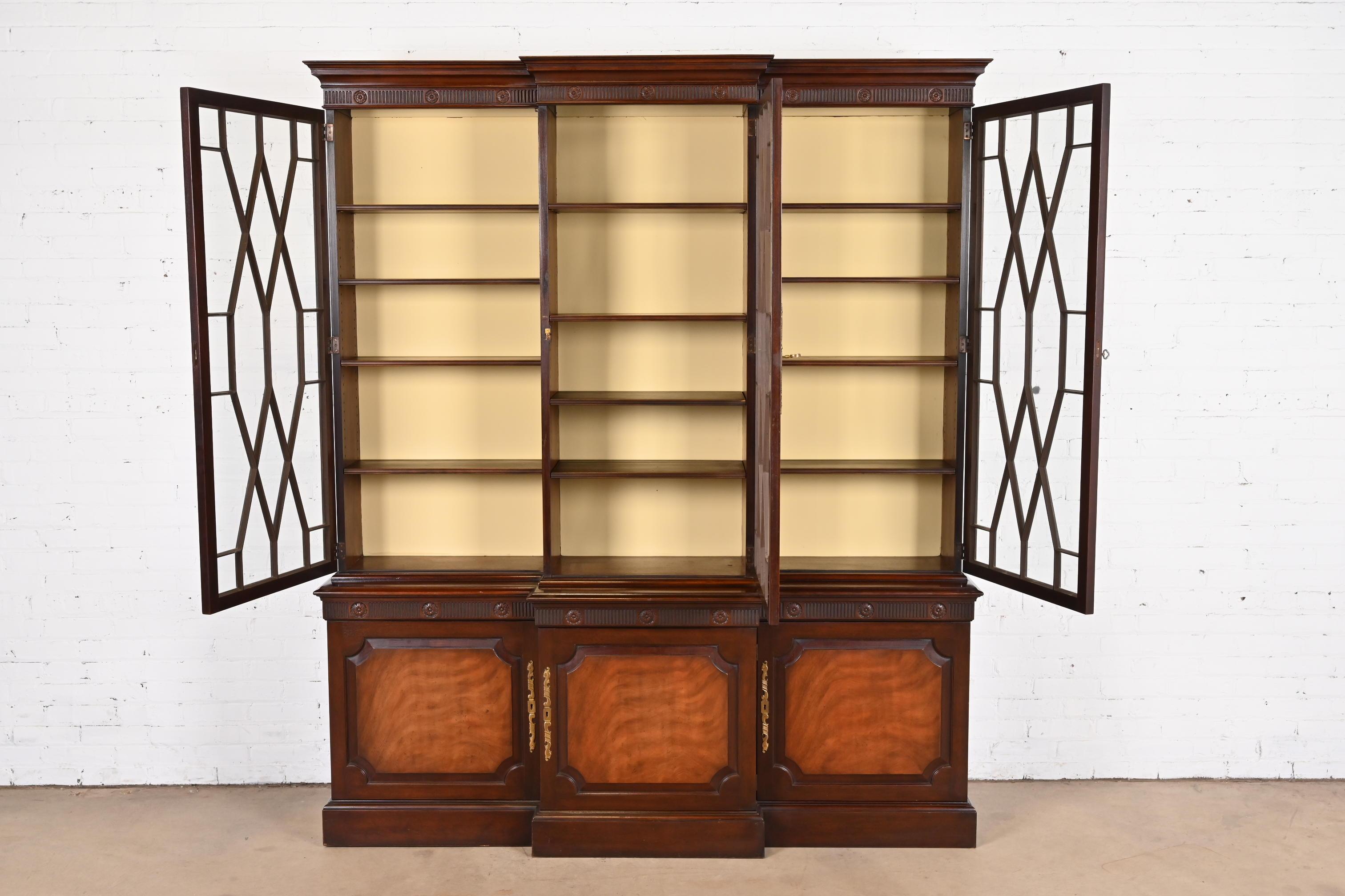 Mid-20th Century Baker Furniture Georgian Carved Mahogany Breakfront Bookcase Cabinet For Sale