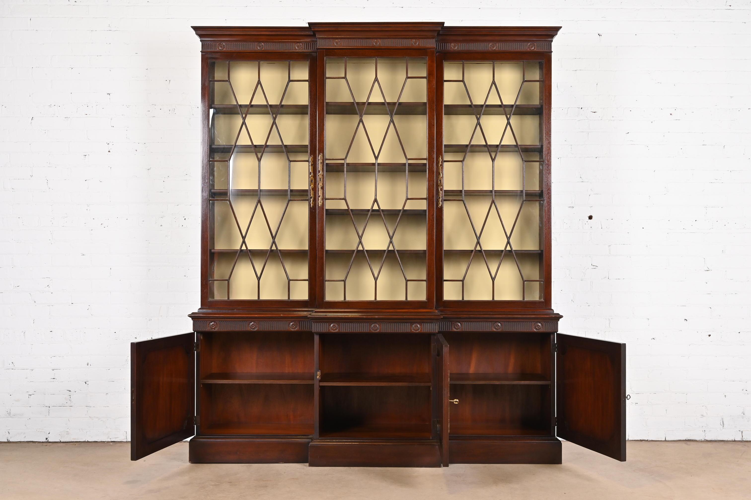 Mid-20th Century Baker Furniture Georgian Carved Mahogany Breakfront Bookcase Cabinet For Sale