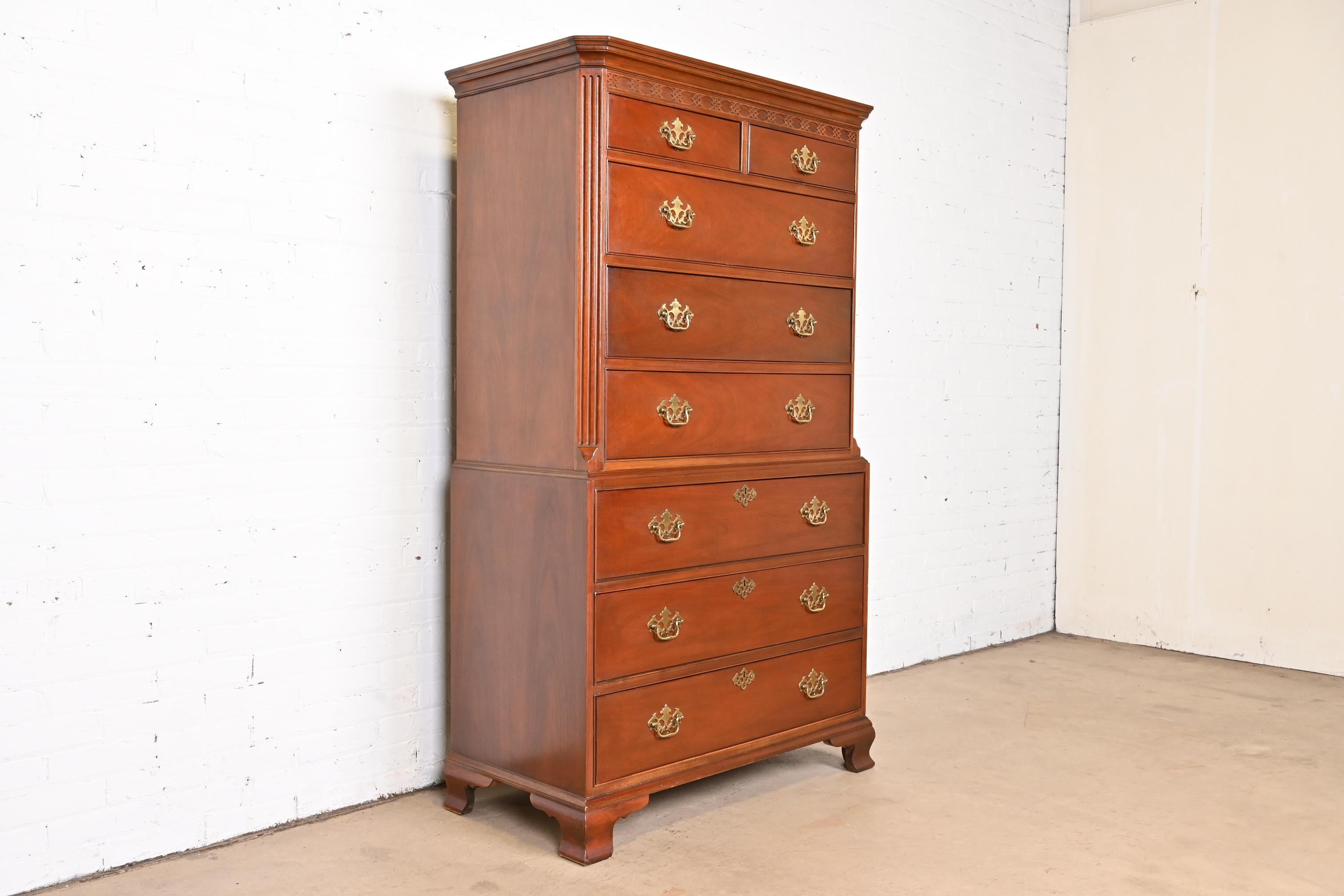 A gorgeous Georgian or Chippendale style eight-drawer highboy dresser or chest of drawers

By Baker Furniture

USA, circa 1980s

Carved mahogany, with original brass hardware.

Measures: 39.5