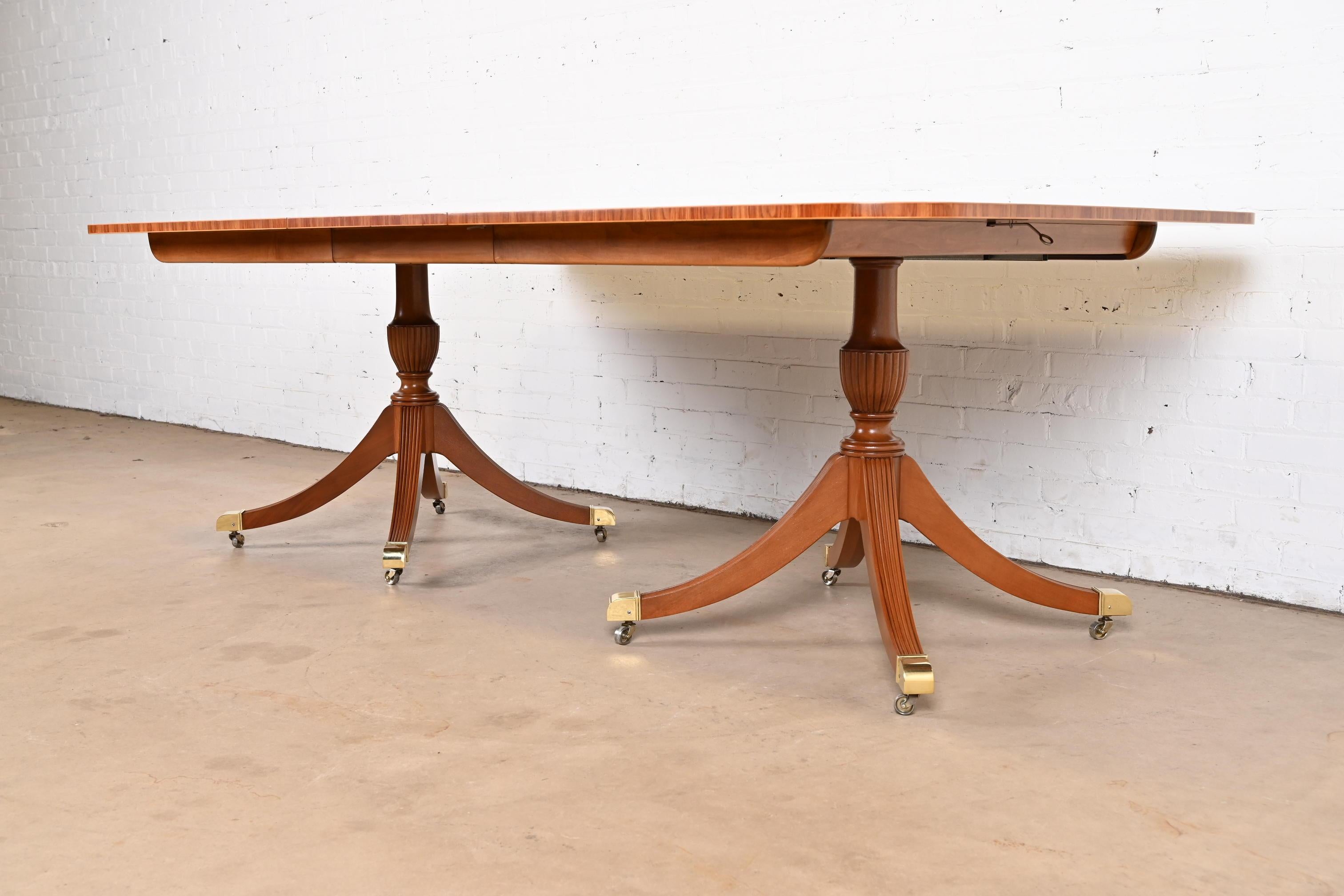20th Century  Baker Furniture Georgian Cherry and Satinwood Double Pedestal Dining Table For Sale