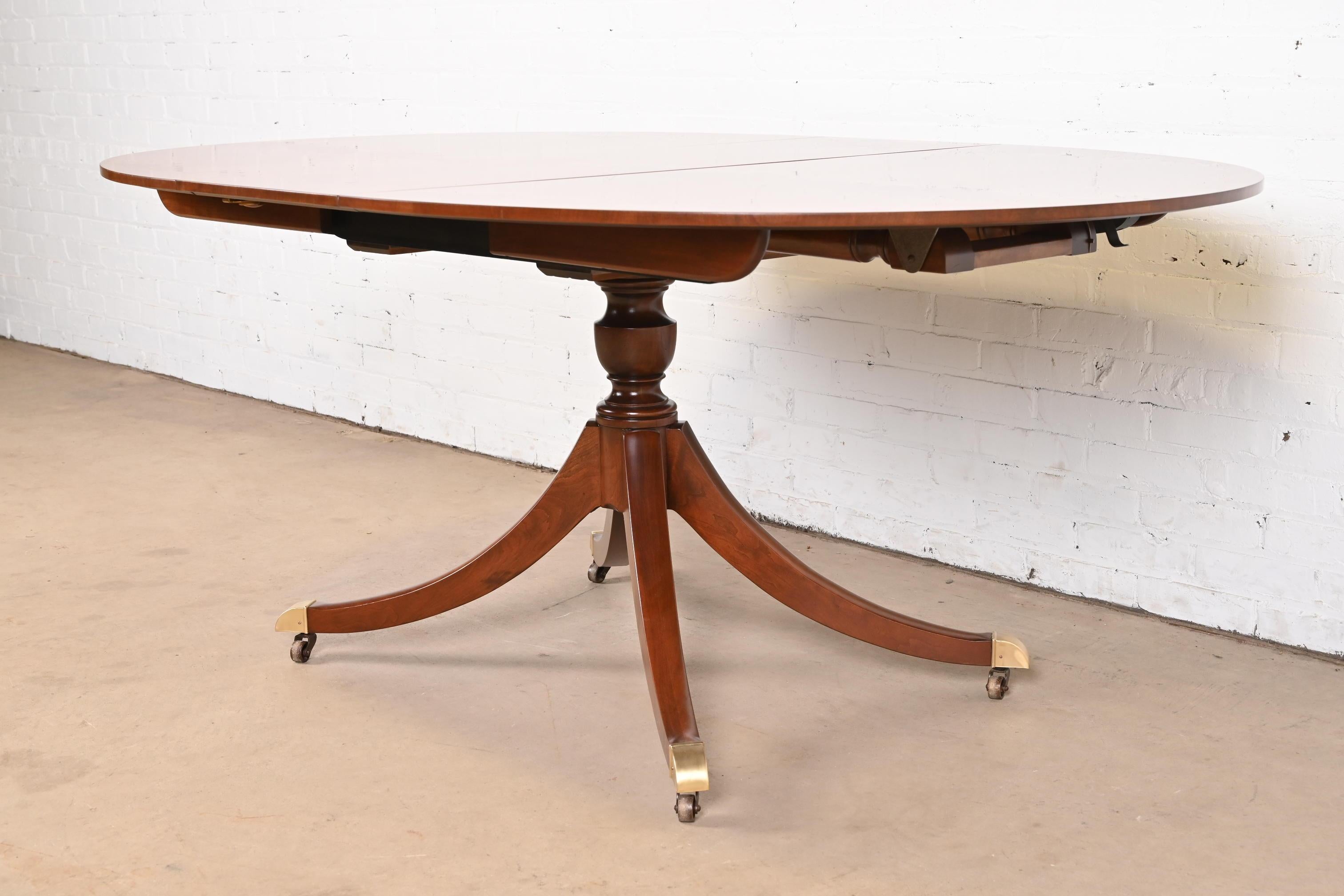 Baker Furniture Georgian Cherry Wood Pedestal Extension Dining Table, Refinished In Good Condition For Sale In South Bend, IN