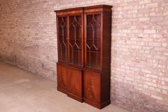 Baker Furniture Georgian Flame Mahogany Breakfront Bookcase Cabinet, circa 1940s