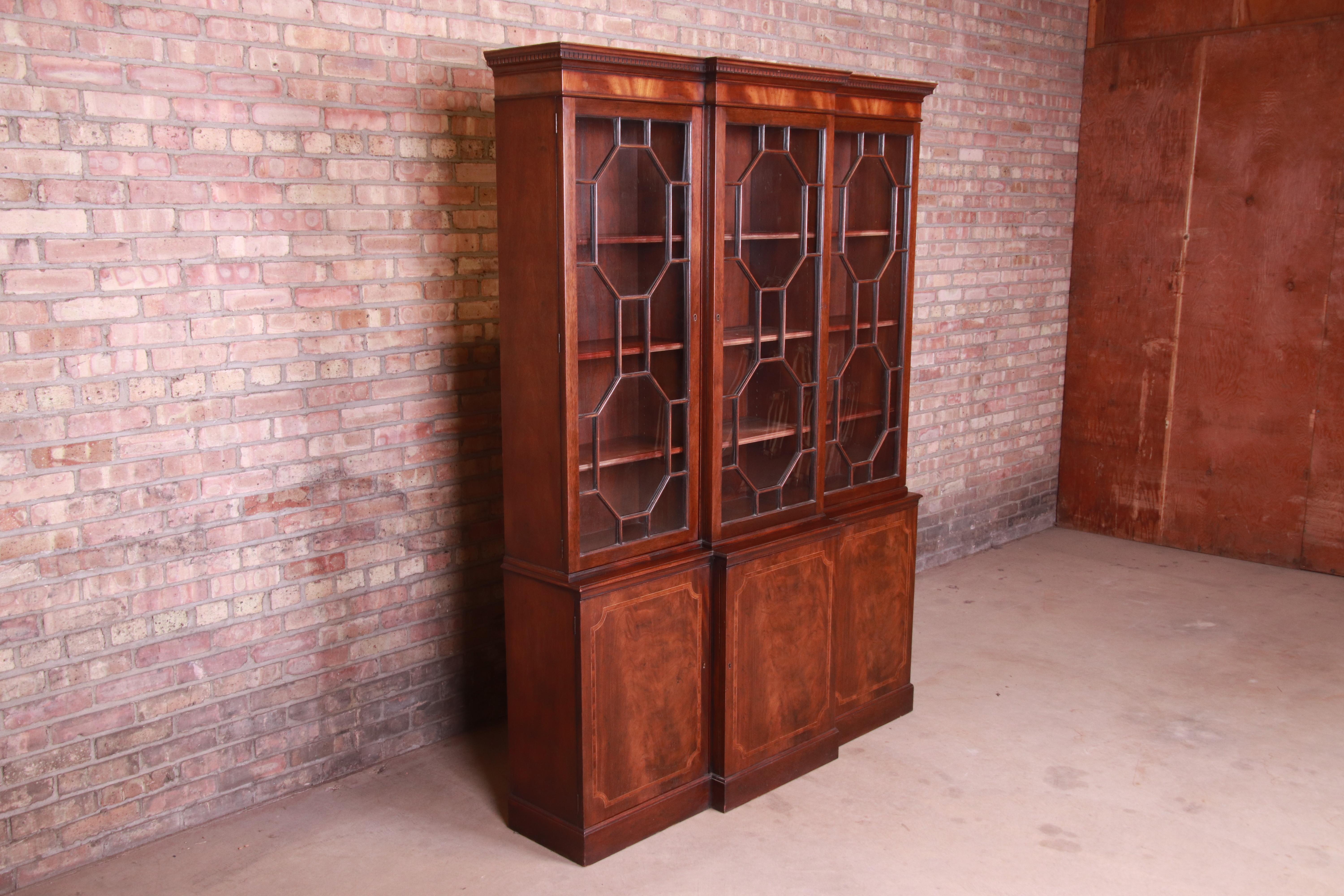 Baker Furniture Georgian Flame Mahogany Breakfront Bookcase Cabinet, circa 1940s In Good Condition In South Bend, IN