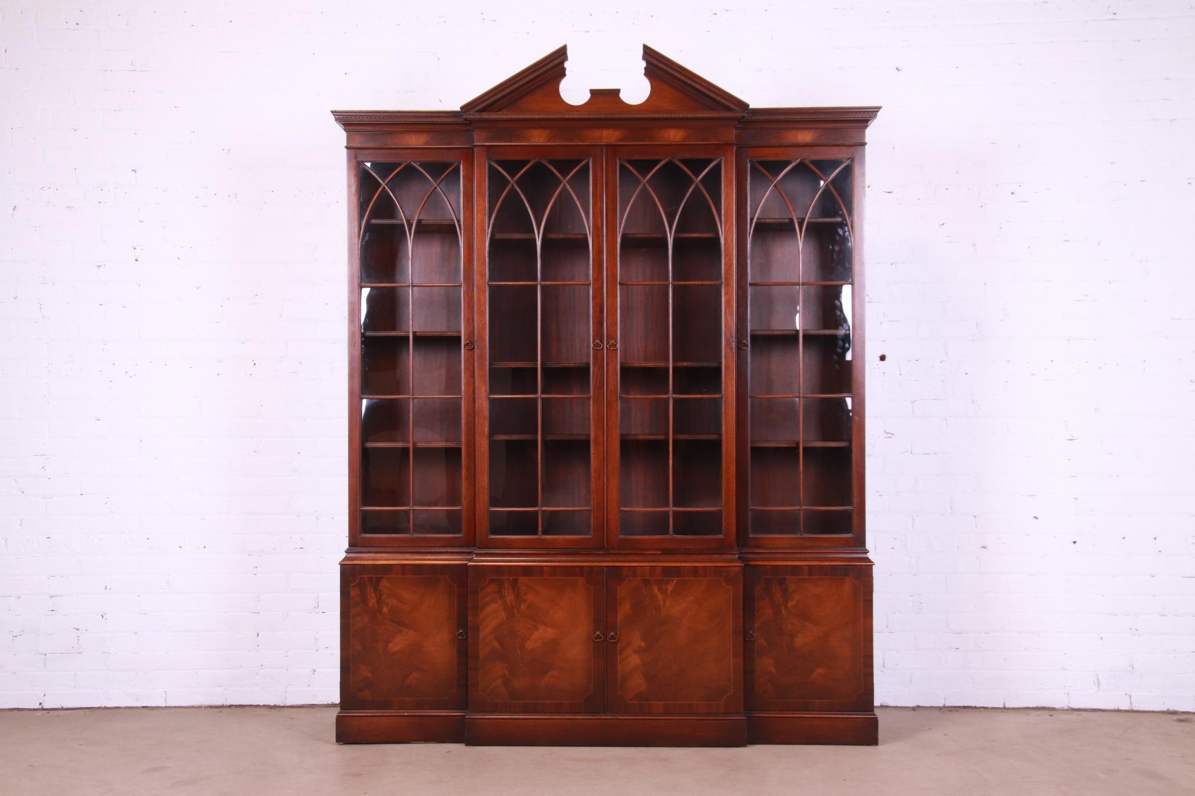 Mid-20th Century Baker Furniture Georgian Flame Mahogany Breakfront Bookcase Cabinet, Circa 1940s