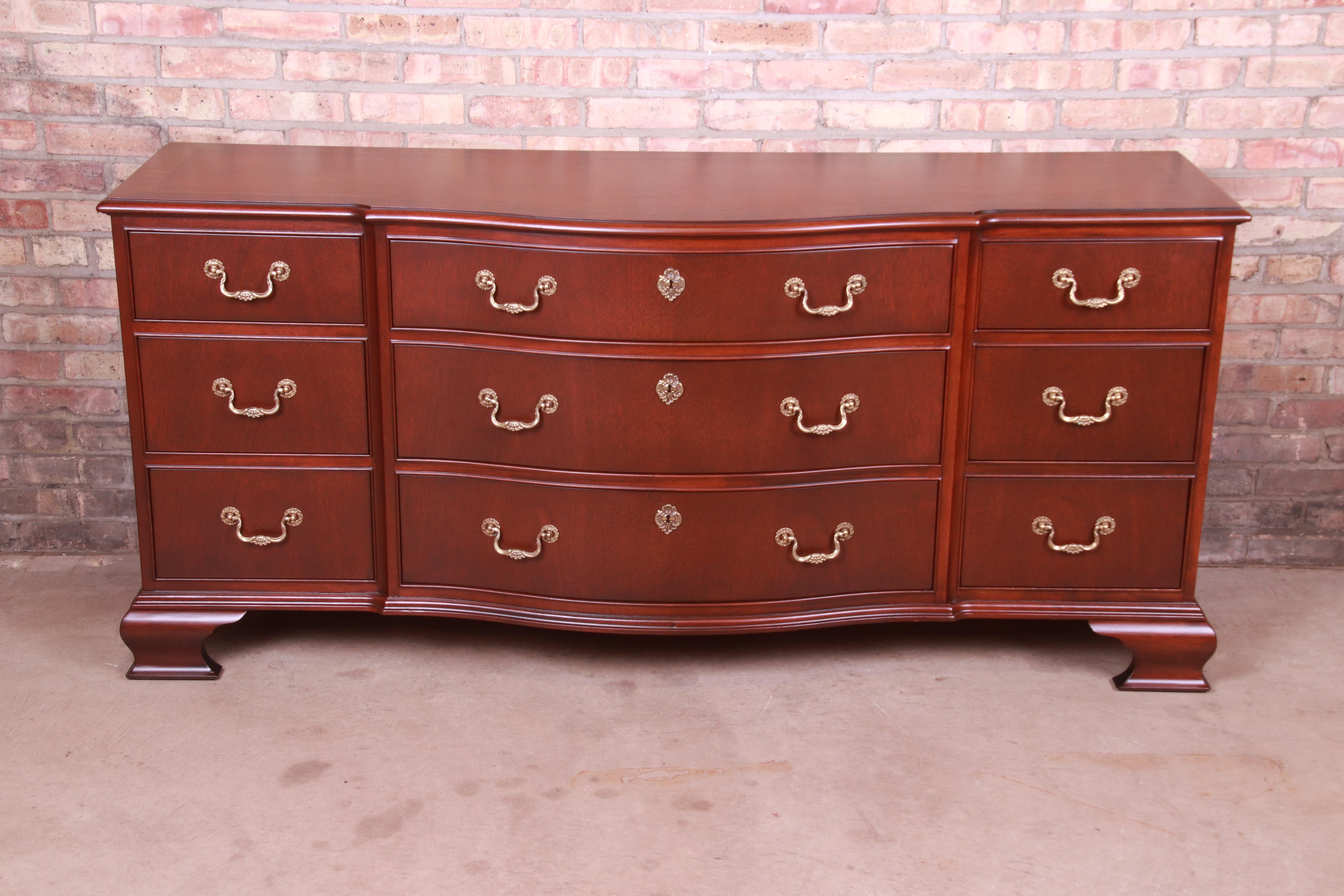An exceptional Georgian or Chippendale style triple dresser or credenza

By Baker Furniture

USA, Circa 1980s

Carved mahogany, with original brass hardware.

Measures: 71.25