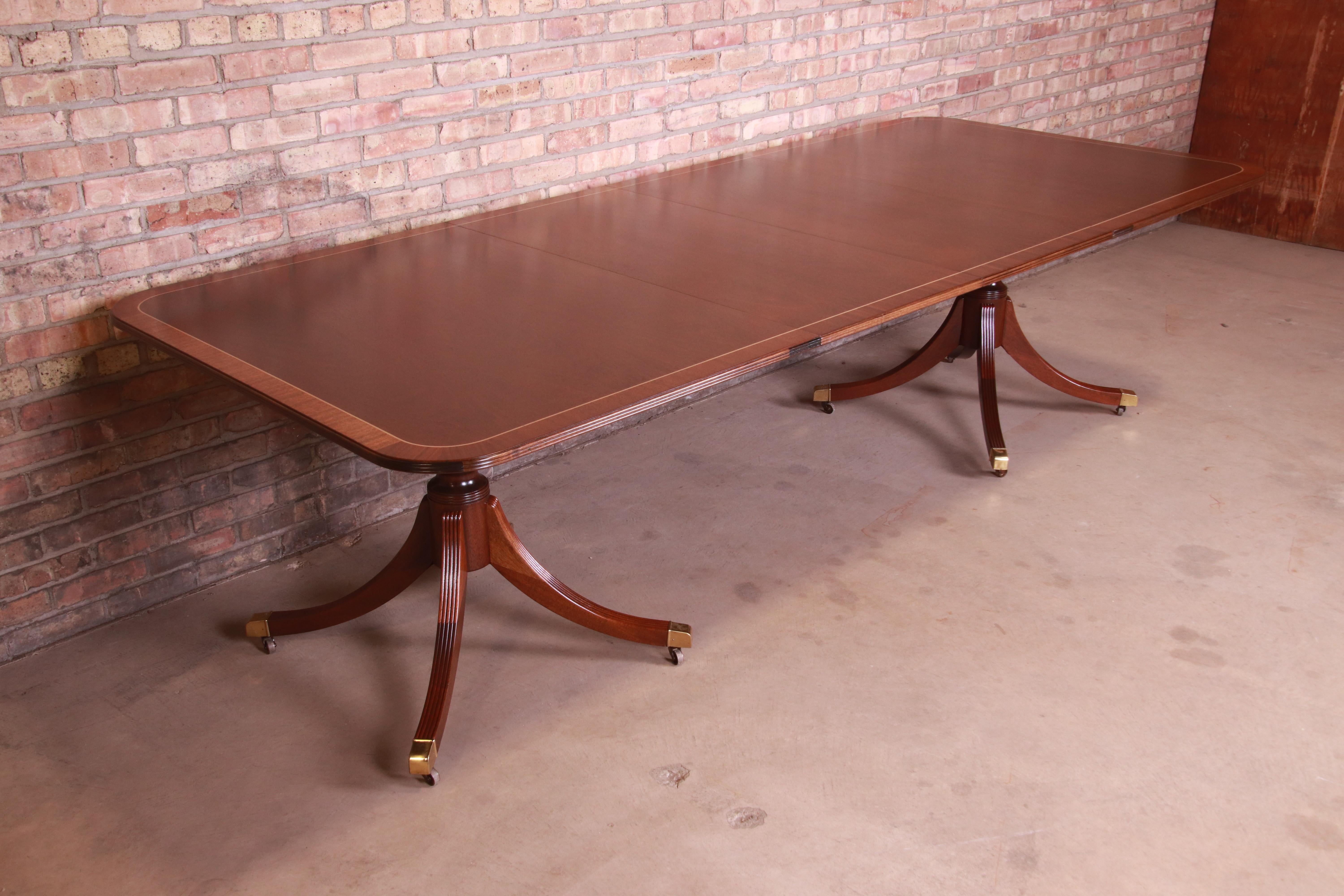 An exceptional Georgian style extension double pedestal dining table

By Baker Furniture 