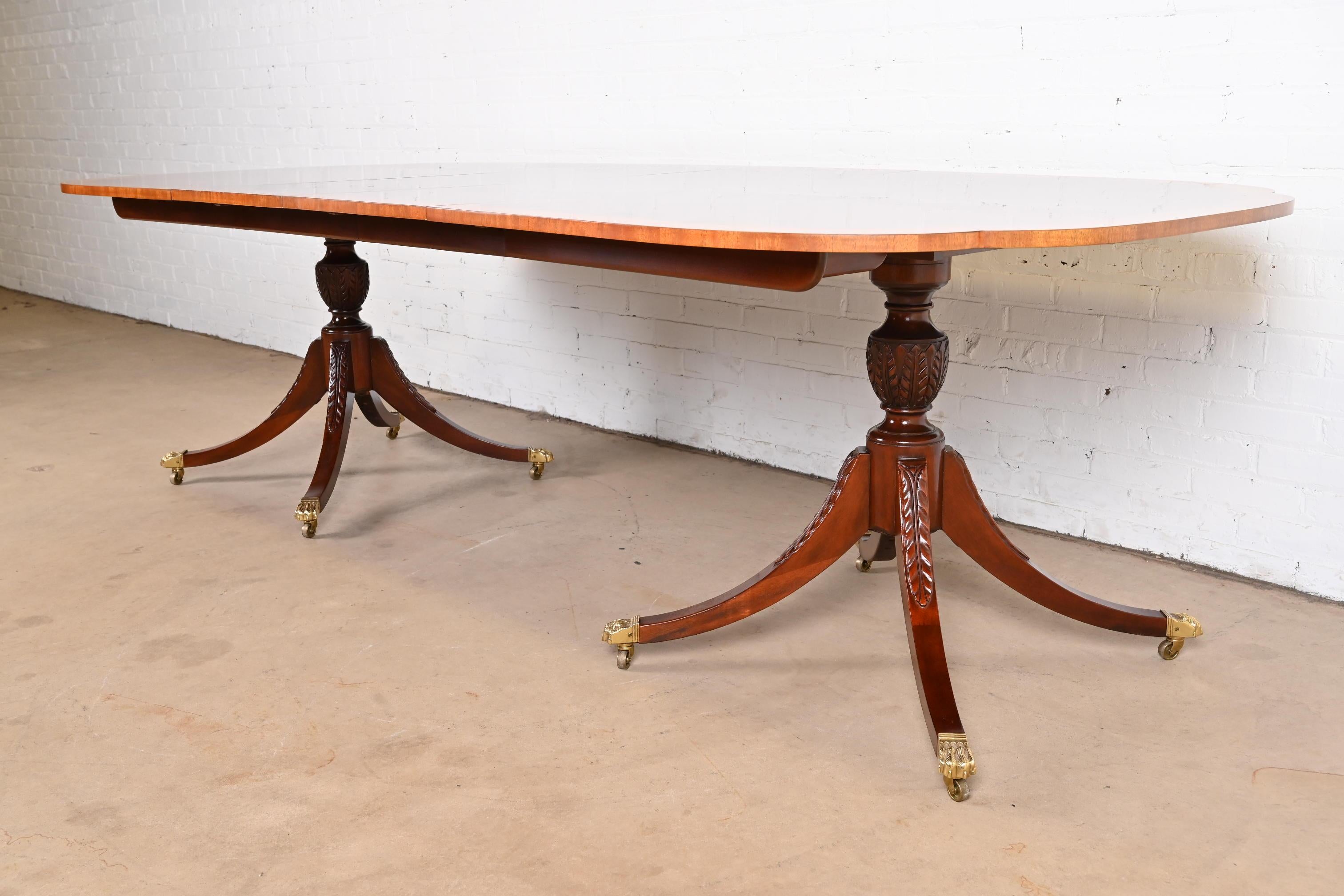 20th Century Baker Furniture Georgian Mahogany Double Pedestal Extension Dining Table