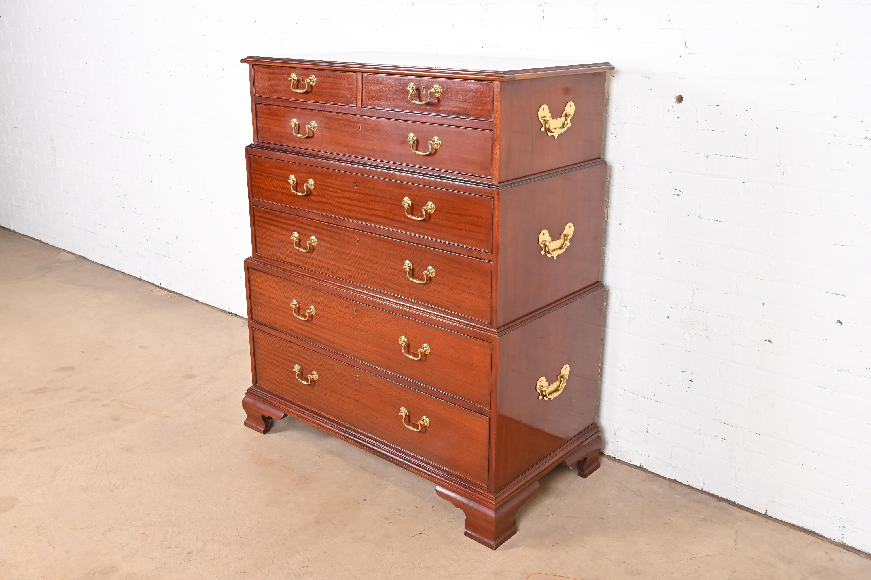 A gorgeous Georgian or Chippendale style triple chest-on-chest seven-drawer highboy dresser or chest of drawers

By Baker Furniture, 
