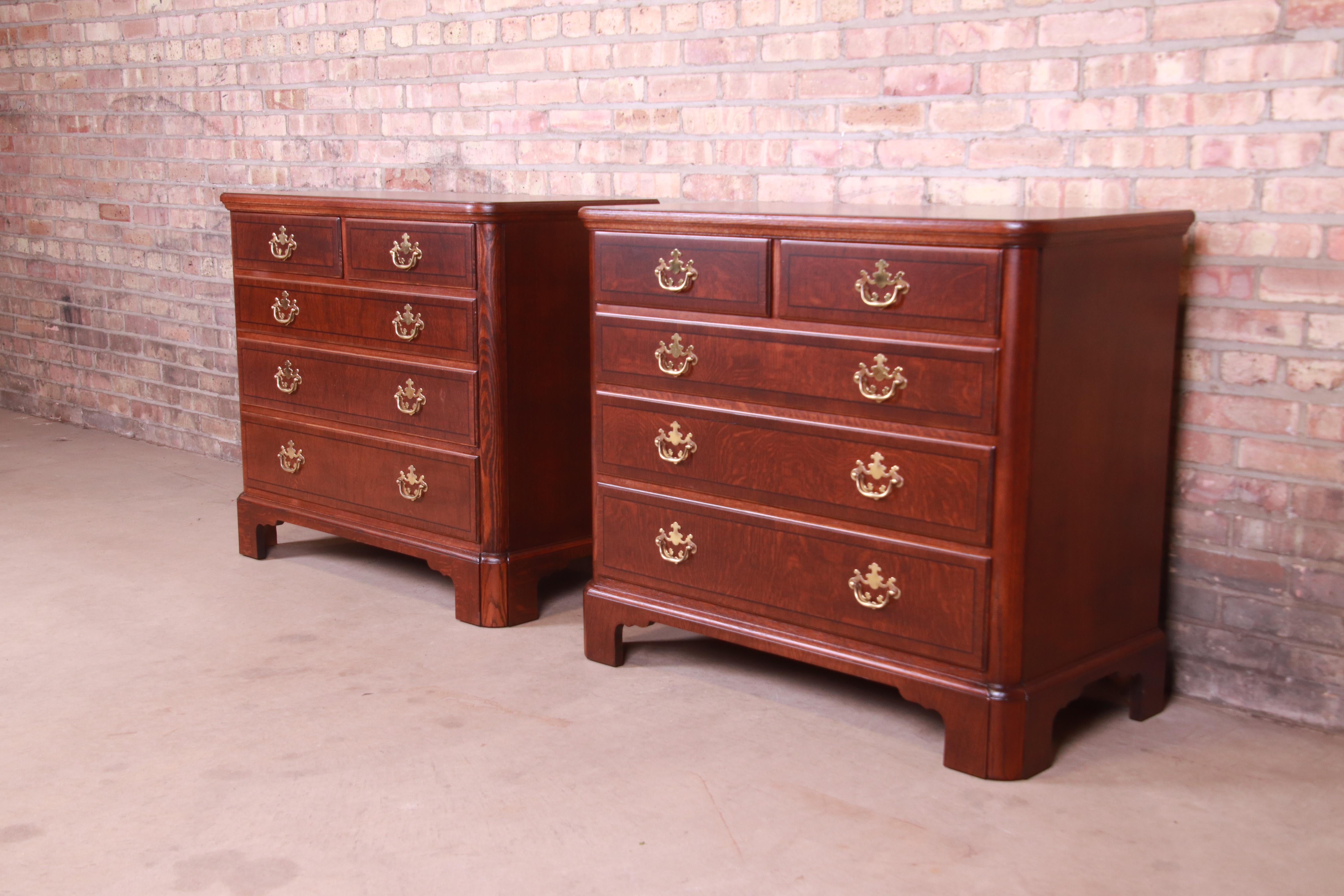 An exceptional pair of Georgian or Chippendale style dresser chests

By Baker Furniture,

USA, Circa 1980s

Quarter sawn oak, with original brass hardware.

Measures: 37.75