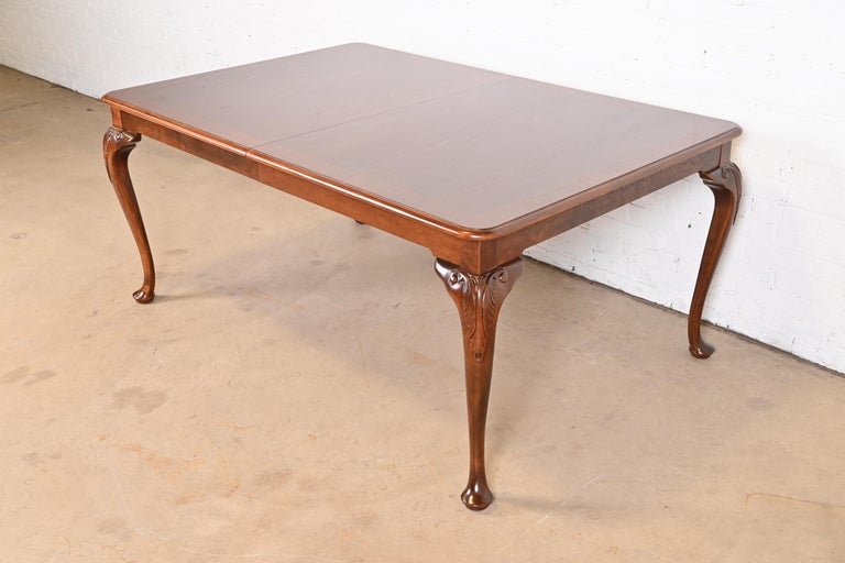 Baker Furniture Queen Anne Walnut and Burl Dining Table