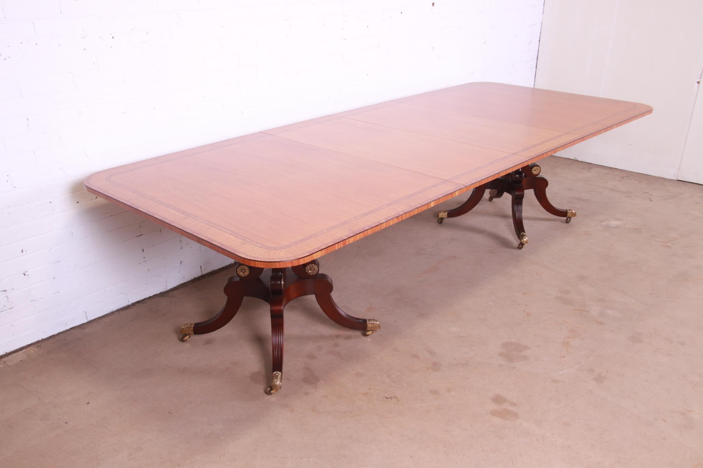 20th Century Baker Furniture Georgian Satinwood and Mahogany Double Pedestal Dining Table