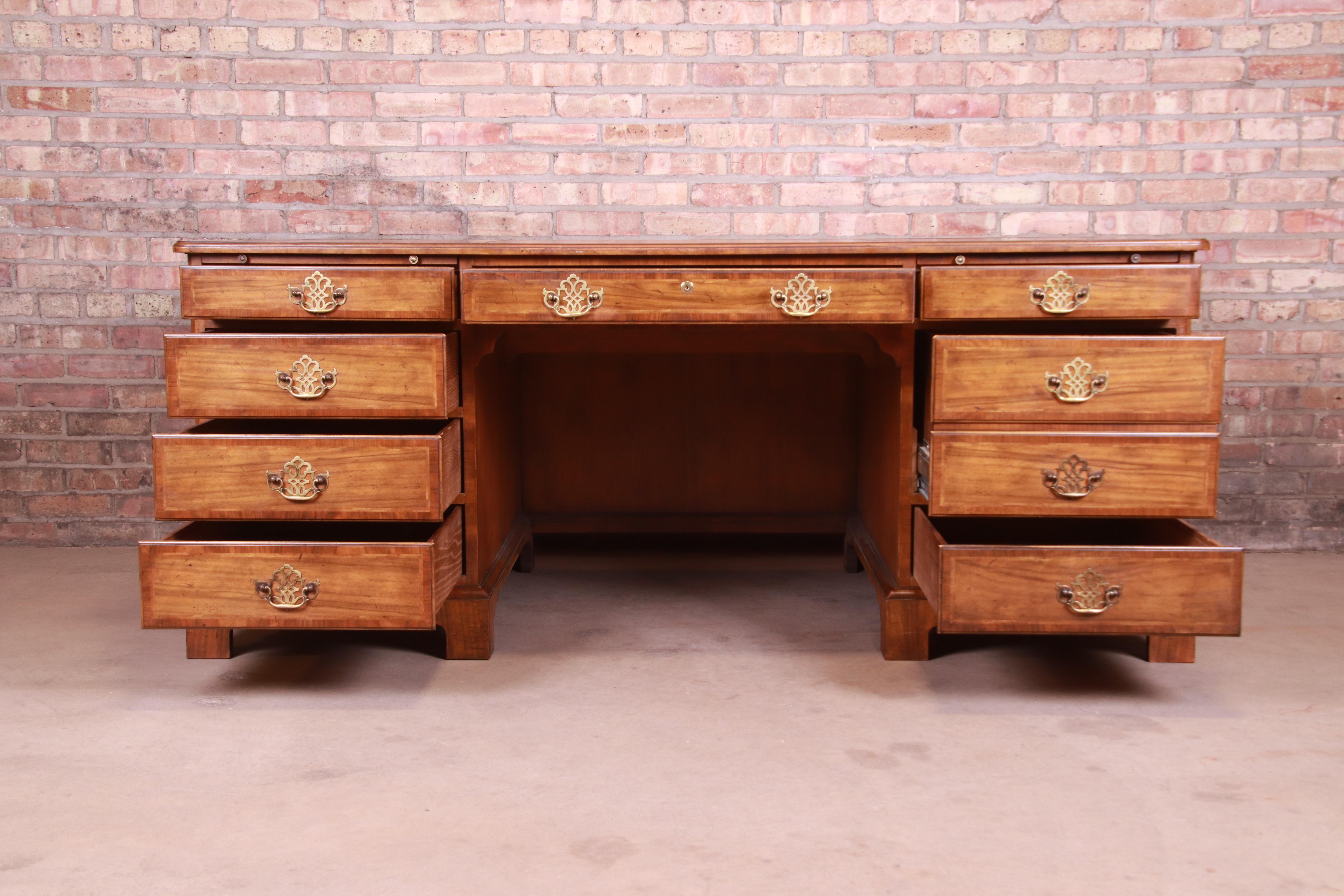Brass Baker Furniture Georgian Walnut Leather Top Executive Desk, 1950s For Sale
