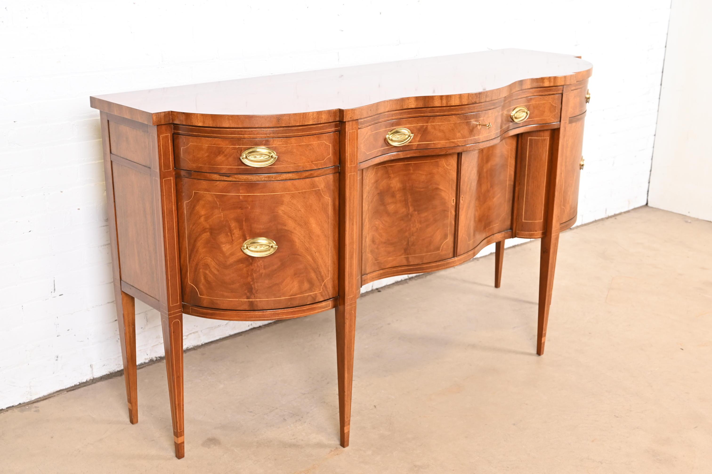20th Century Baker Furniture Hepplewhite Flame Mahogany Serpentine Front Sideboard Credenza