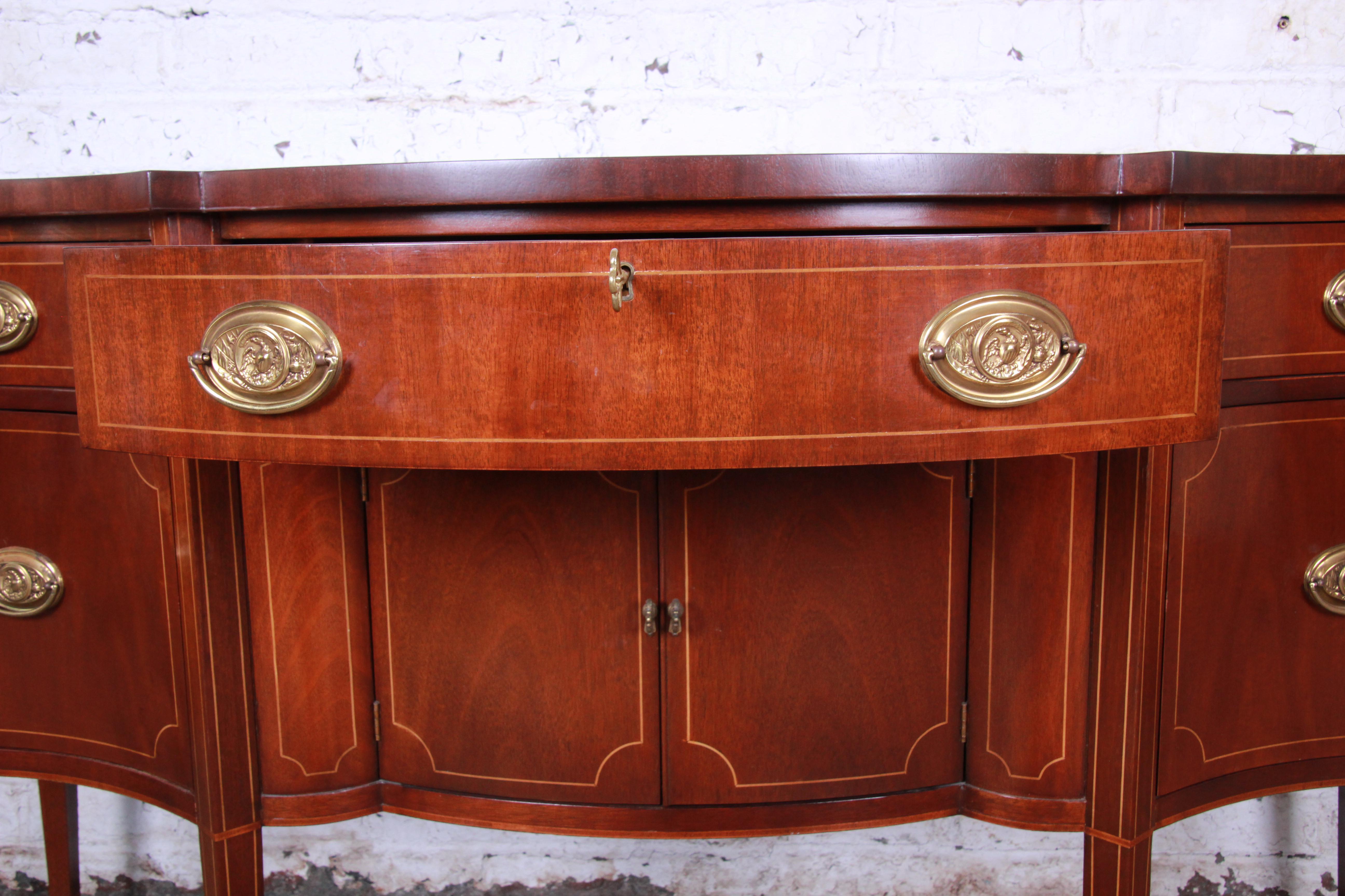 20th Century Baker Furniture Hepplewhite Style Inlaid Mahogany Bow Front Sideboard Credenza