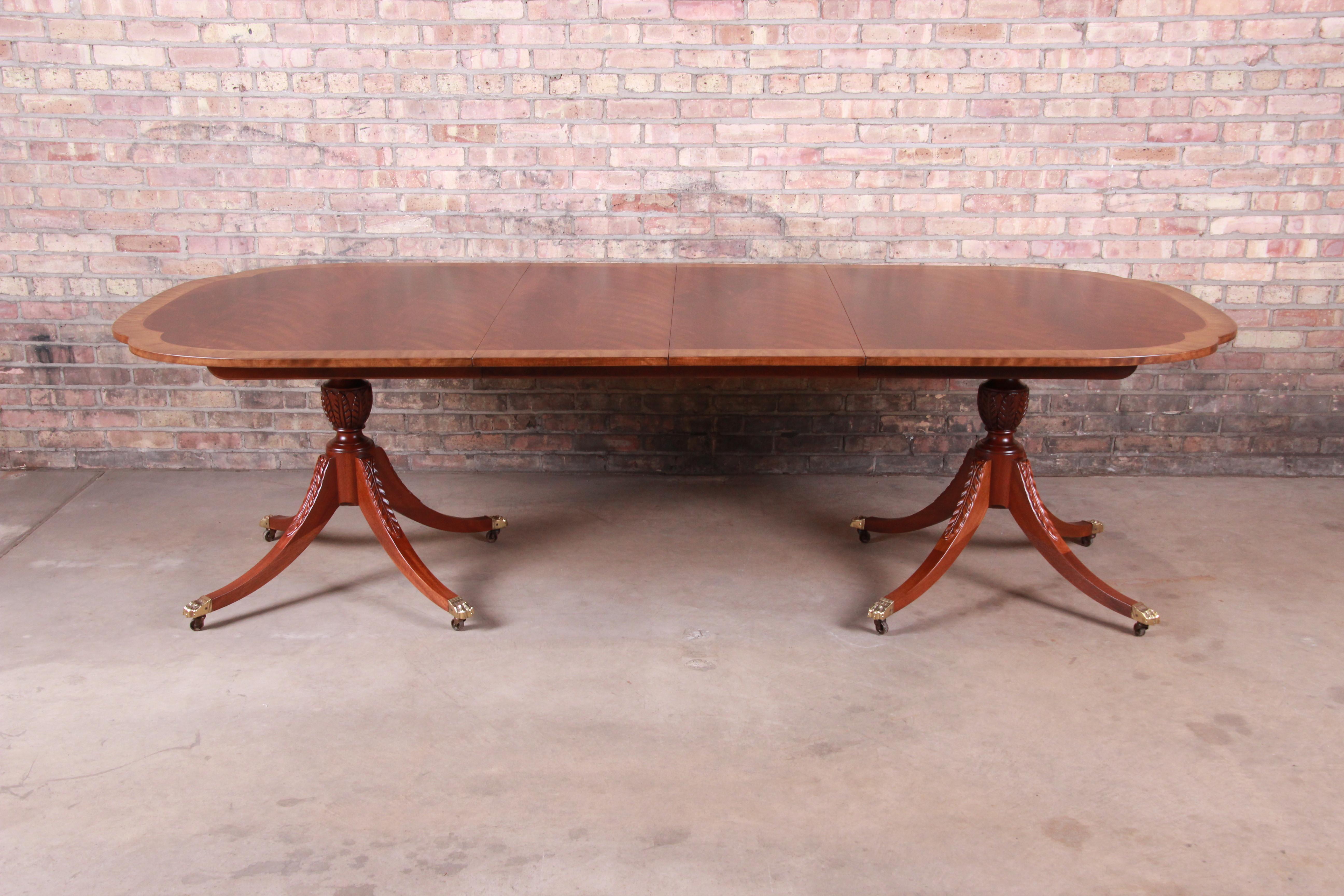 An exceptional Georgian style extension double pedestal dining table

By Baker Furniture 