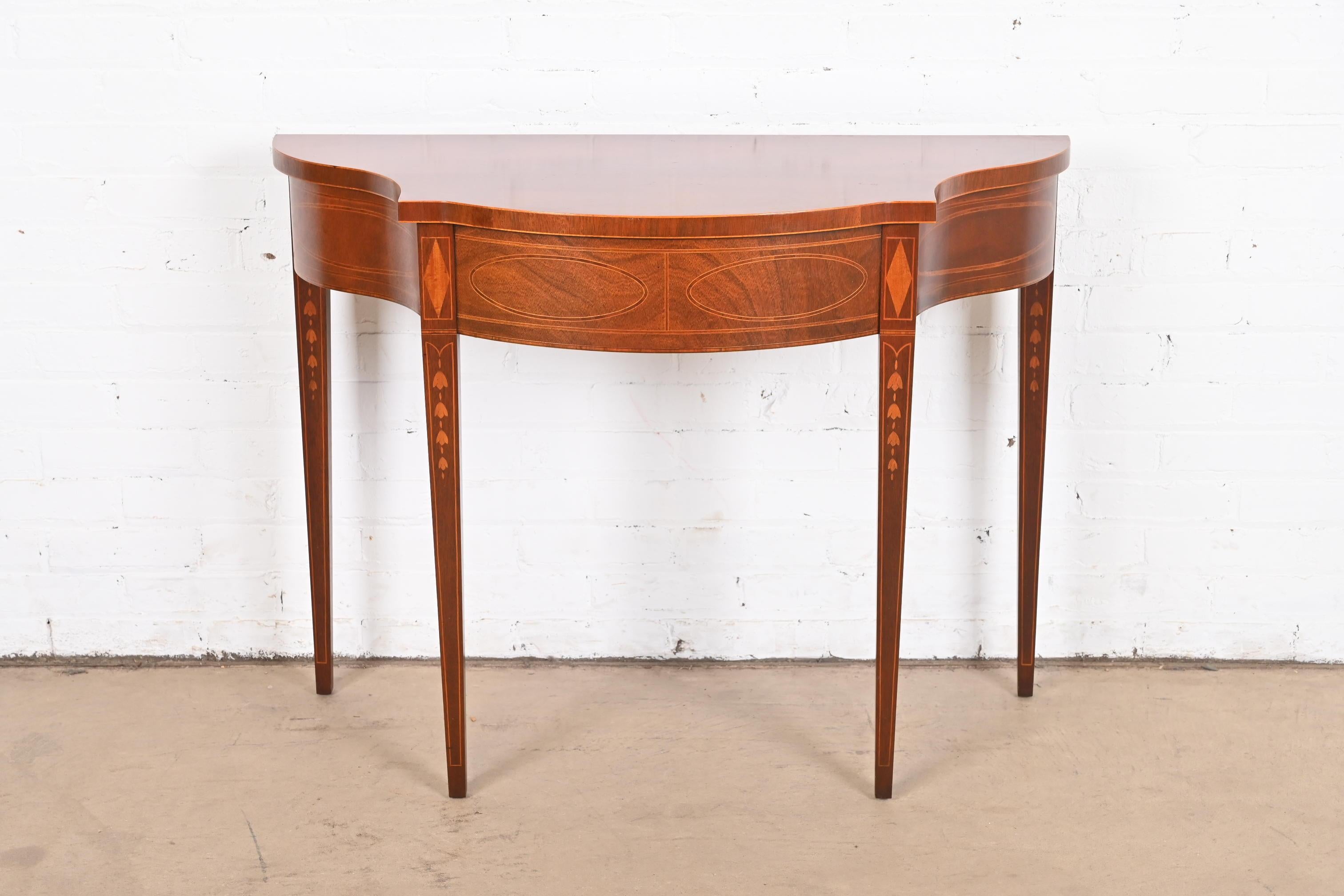 A gorgeous Federal or Hepplewhite style console table, sofa table, or entry table

By Baker Furniture, 