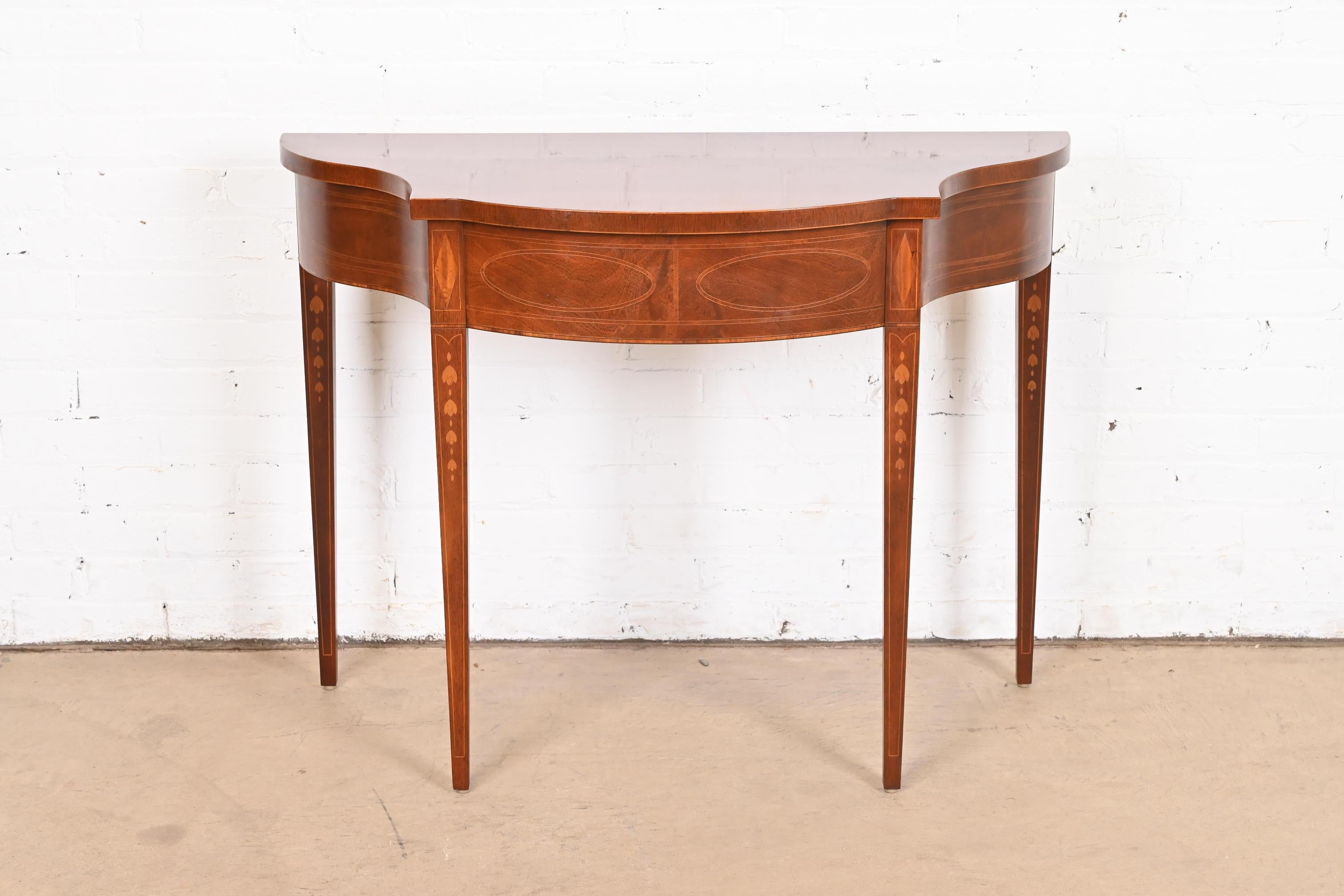 A gorgeous Federal or Hepplewhite style console table, sofa table, or entry table

By Baker Furniture, 