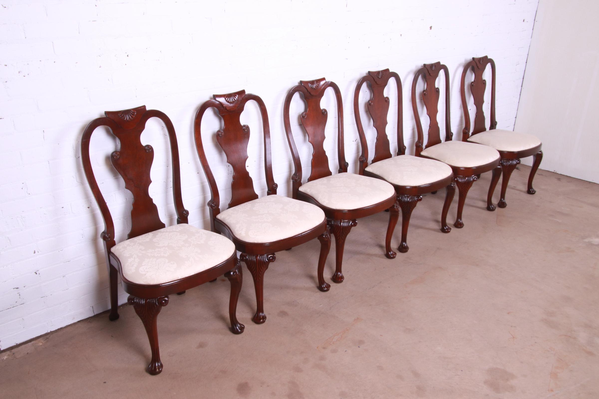 A gorgeous set of six Georgian or Queen Anne style dining chairs

By Baker Furniture, 