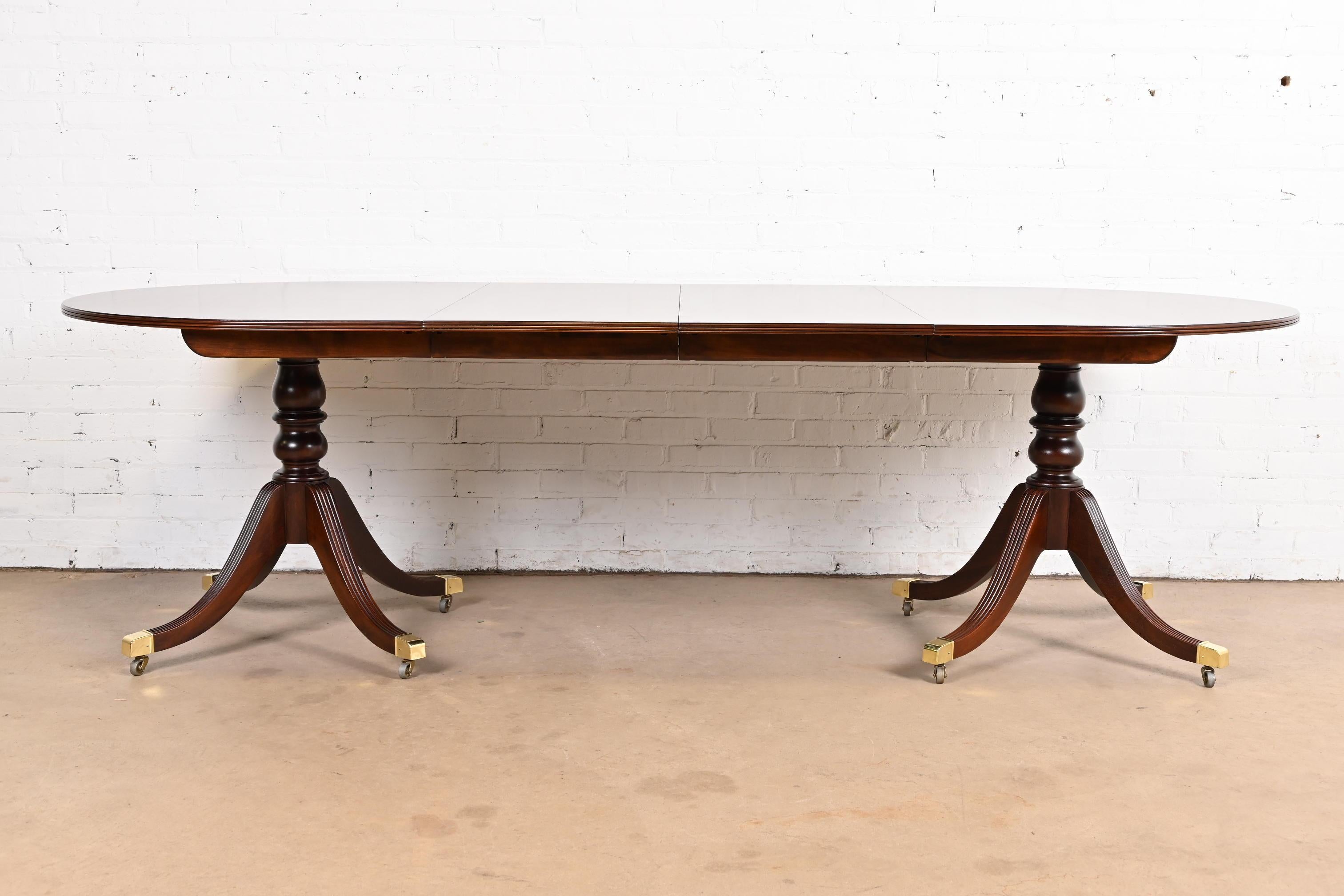 A gorgeous Georgian or Regency style double pedestal extension dining table

By Baker Furniture, 