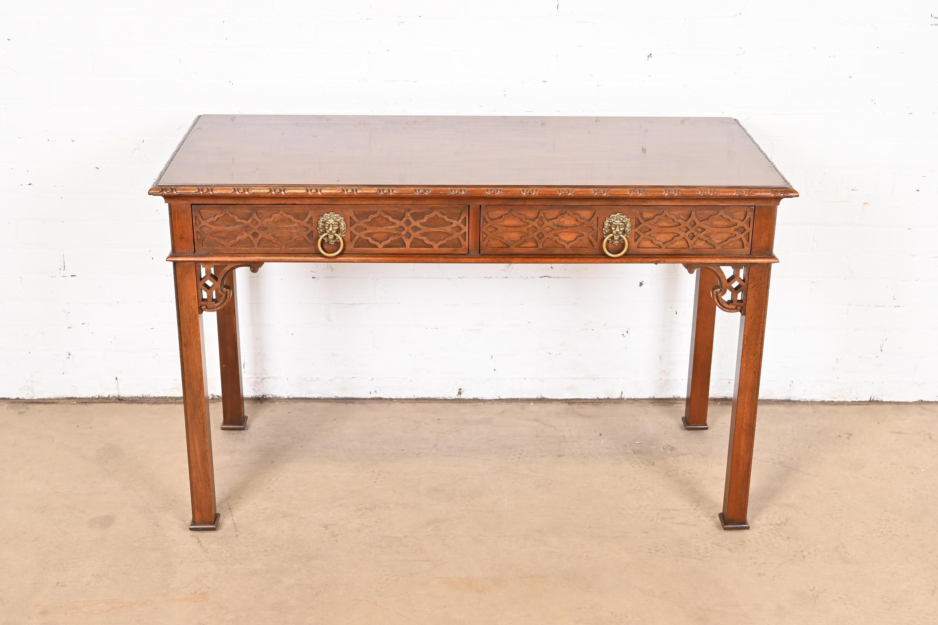 A gorgeous Georgian or Chippendale style writing desk, console table, or sofa table

By Baker Furniture, 