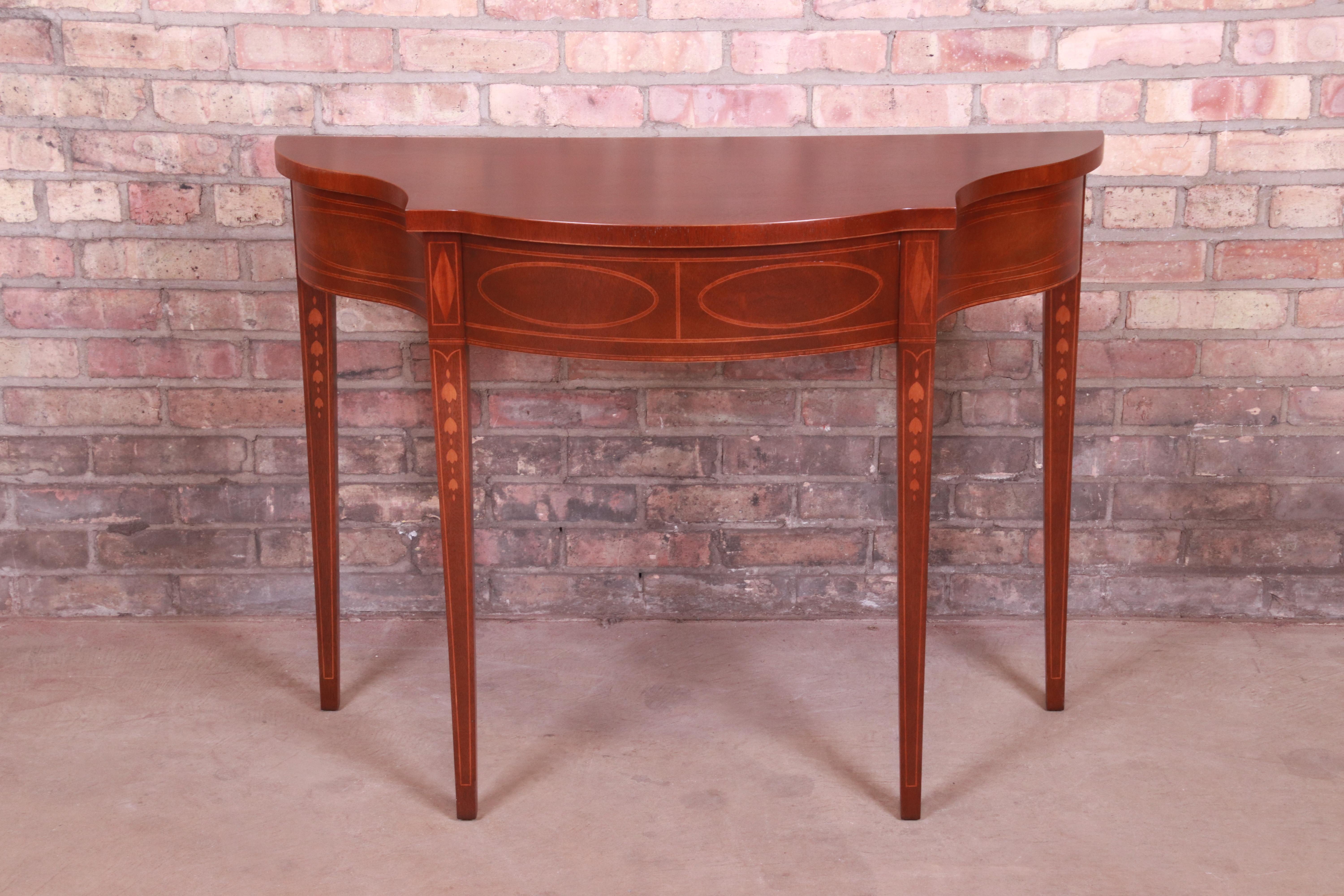 A gorgeous Federal style console or entry table

By Baker Furniture 
