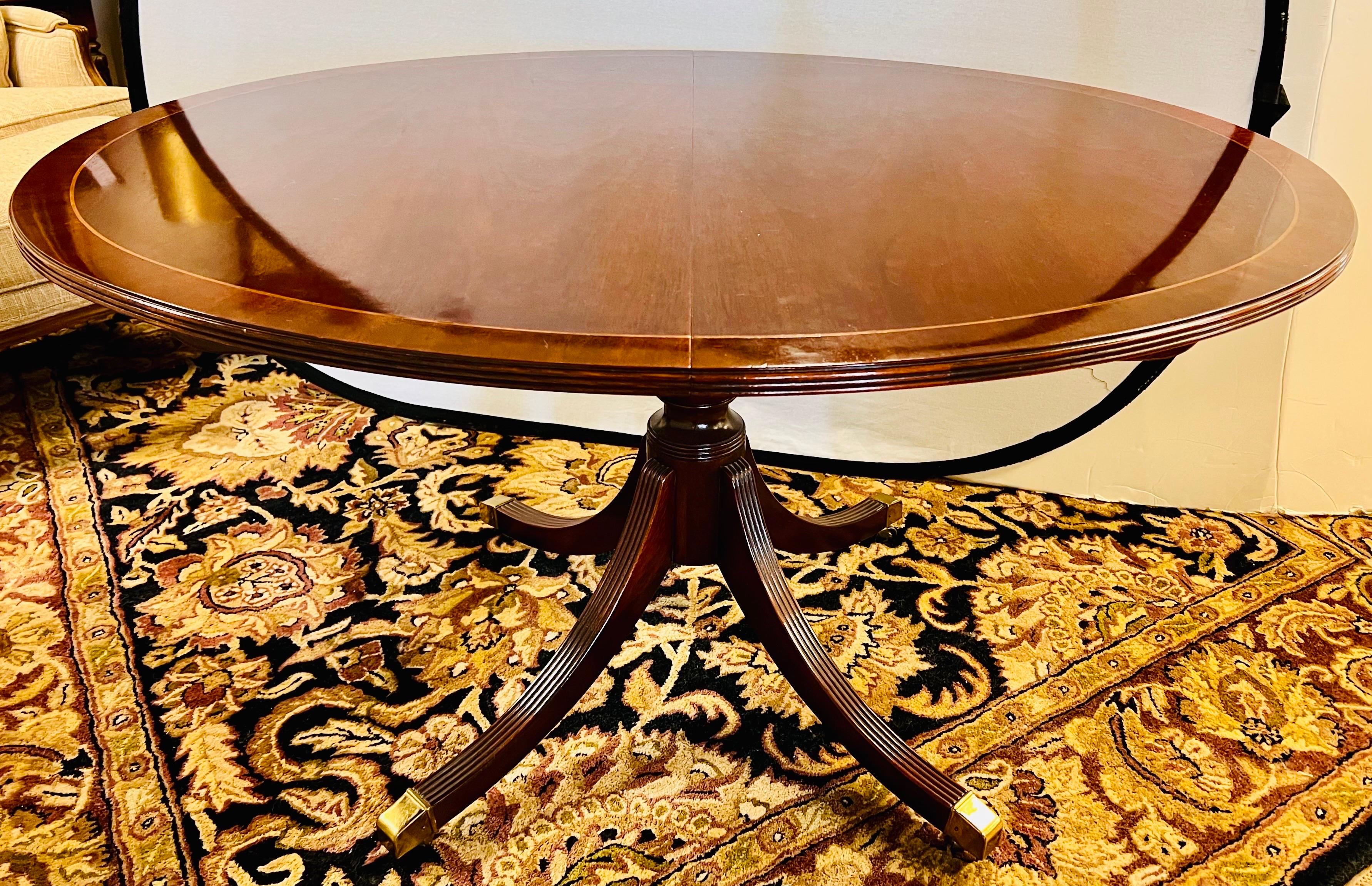 20th Century Baker Furniture Historic Charleston Model Mahogany Inlay Round Oval Dining Table